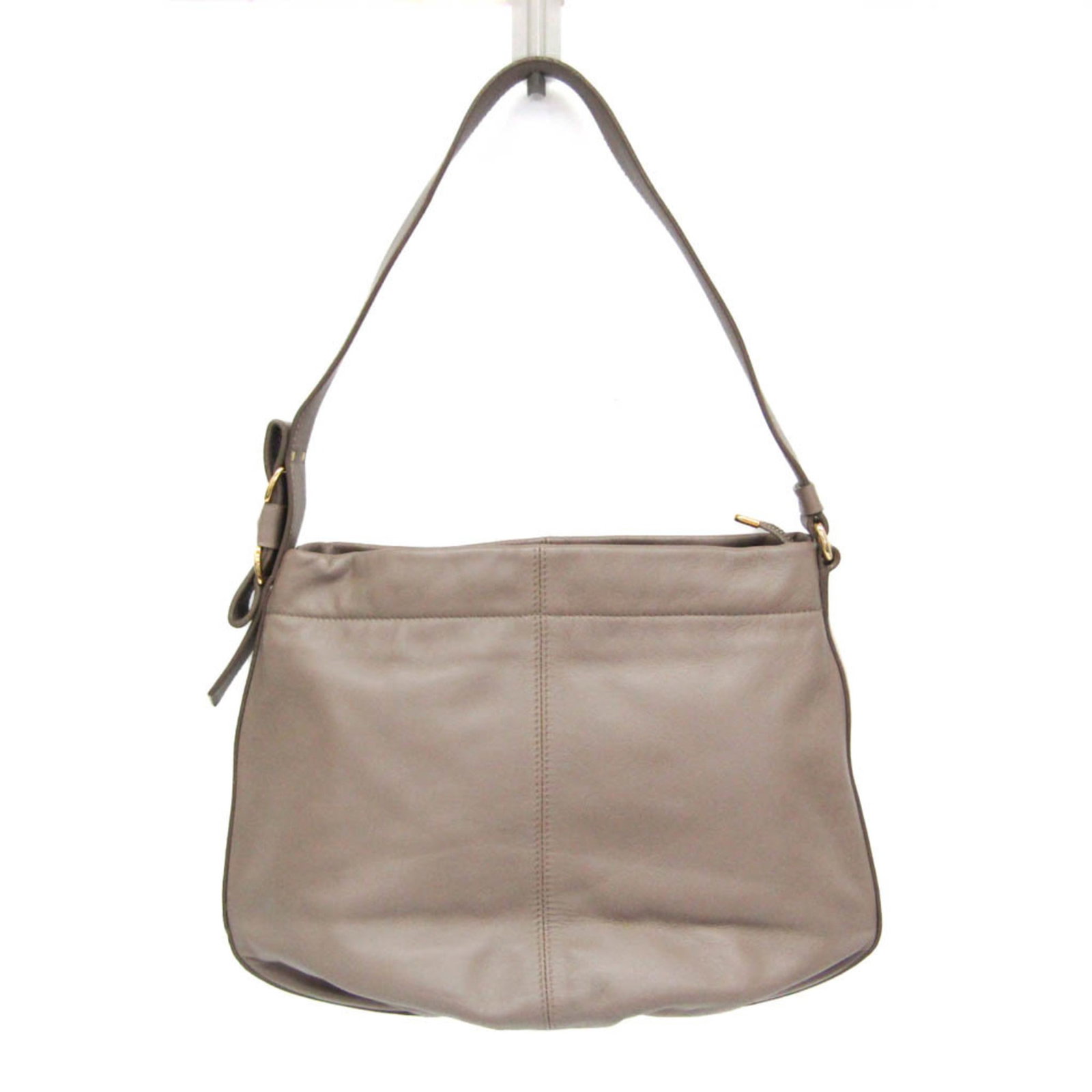 Ferragamo Leather Shoulder Bag: Ferragamo Leather Shoulder Bag The AU-21 D443 shoulder bag from Salvatore Ferragamo is a sleek and versatile leather accessory. Featuring a gray color, zipper closure, and two pockets, this bag boasts