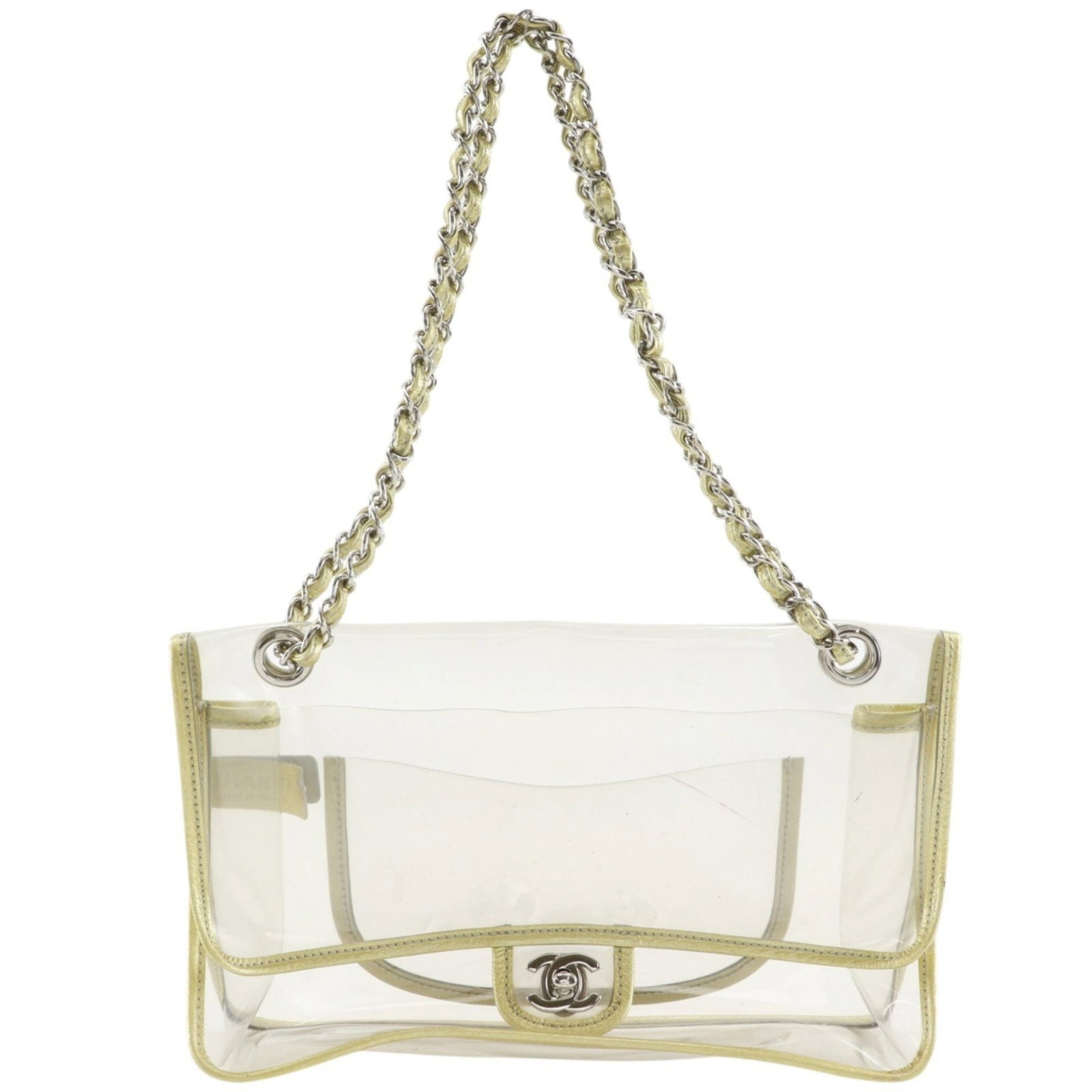 Shoulder Bag By Chanel: Shoulder Bag By Chanel This iconic Chanel shoulder bag boasts a sleek, clear vinyl exterior and a gold turn lock closure, adding a touch of sophisticated elegance to any outfit. Measuring 18cm x 29cm