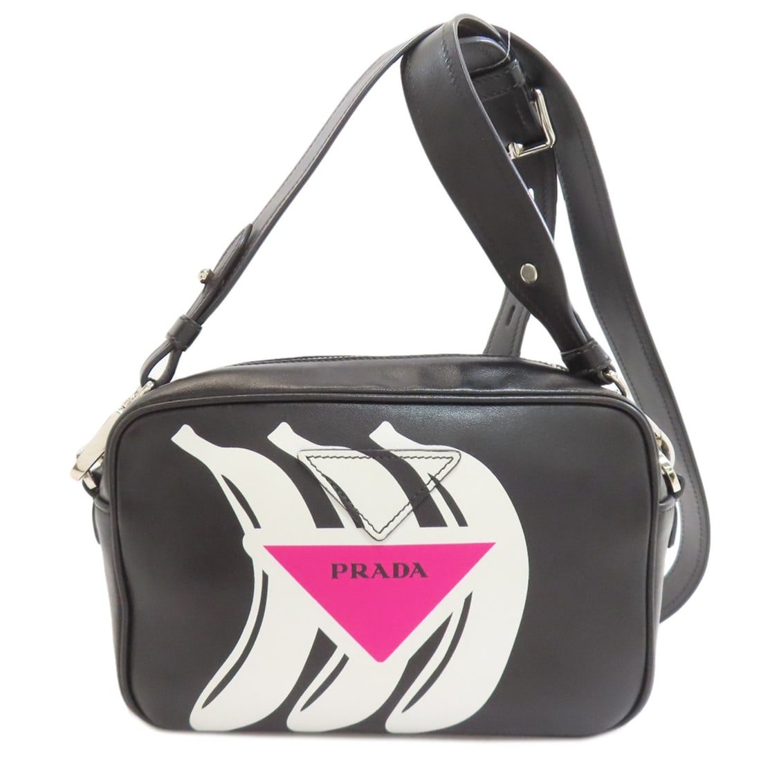 Banana Calf Shoulder Bag: Banana Calf Shoulder Bag Black calf shoulder bag from PRADA, featuring a sleek design and exterior material. This stylish bag is characterized by its black color and calf exterior, making it a versati