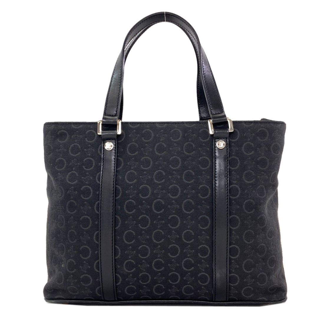 Canvas Macadam Celine Tote Bag: Canvas Macadam Celine Tote Bag Black canvas tote bag from CELINE, featuring a classic style with a timeless design. Made from high-quality canvas, this tote bag boasts a sleek and sophisticated look. 