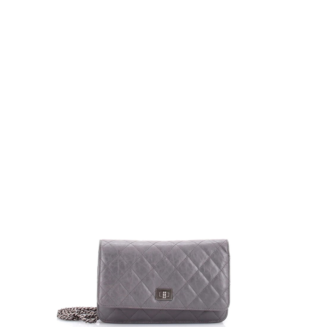 Chanel Reissue 2.55 Wallet on Chain Quilted Aged Calfskin: Chanel Reissue 2.55 Wallet on Chain Quilted Aged Calfskin The Chanel Reissue 2.55 Wallet on Chain Quilted Aged Calfskin boasts a timeless design with a gray exterior and interior, complemented by
