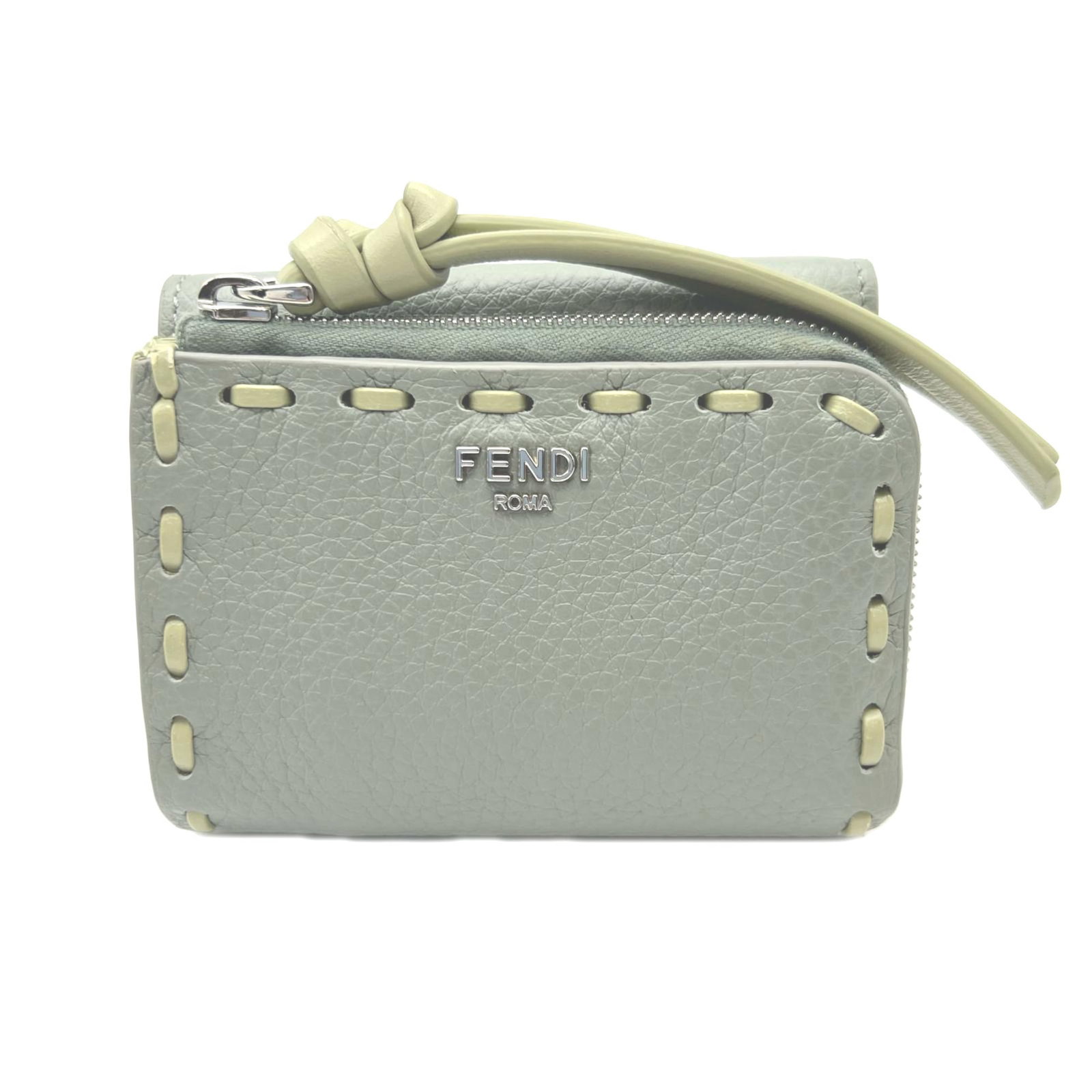 Fendi Wallet (Tri-Fold) Leather: Fendi Wallet (Tri-Fold) Leather Tri-fold leather wallet from Fendi, crafted from high-quality calfskin, features a striking green color and sleek design. The wallet's compact size makes it easy to