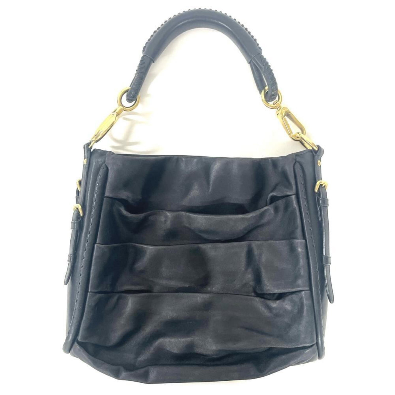 Shoulder Bag Leather Christian Dior: Shoulder Bag Leather Christian Dior Christian Dior's sleek shoulder bag is crafted from high-quality leather, boasting a timeless black color that exudes sophistication. Measuring 26cm x 32cm x 10cm,