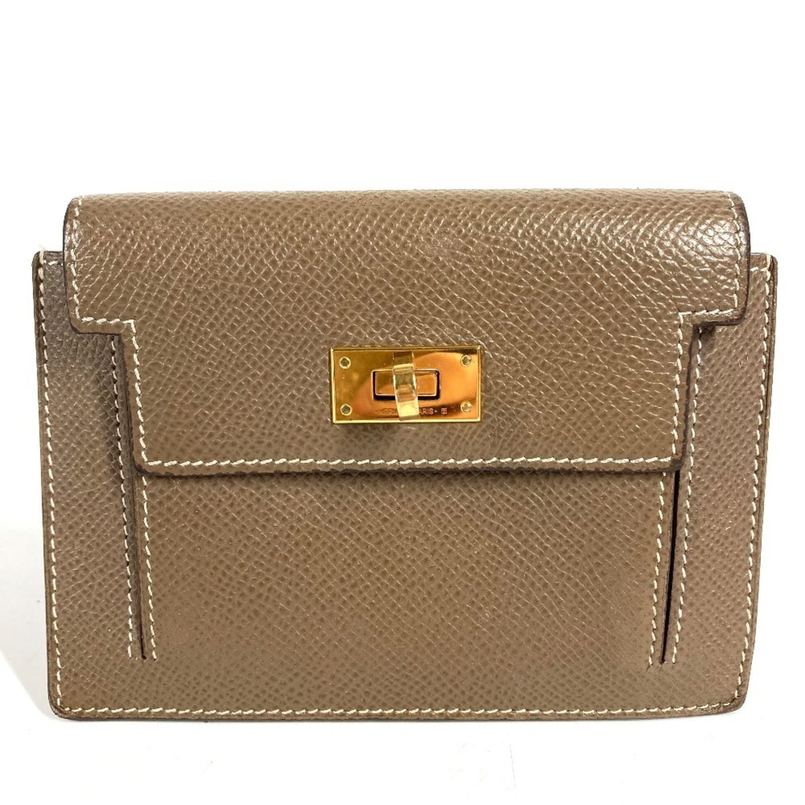 Hermes Coin Purse/ Coin Case Epsom Leather: Hermes Coin Purse/ Coin Case Epsom Leather Etoupe gray Epsom leather coin purse/coin case from Hermes, a classic accessory for everyday use. Measuring 9.5cm x 13cm, this compact and stylish piece is