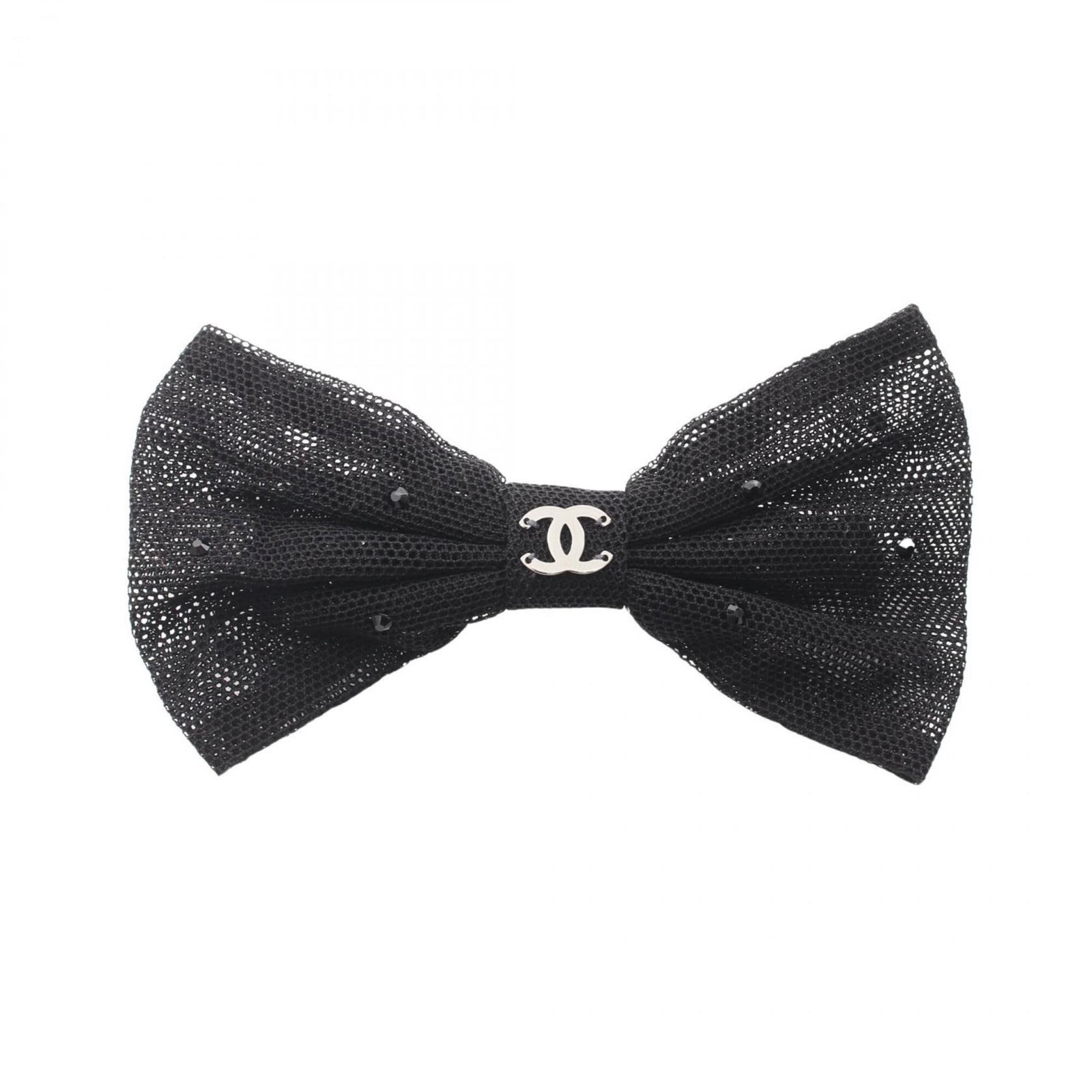 Barrette Chanel: Barrette Chanel Black rhinestone barrette from Chanel, measuring 11.5cm x 6.5cm. This elegant accessory features a striking black stone design. Its sleek size and rhinestone details make it a stylish