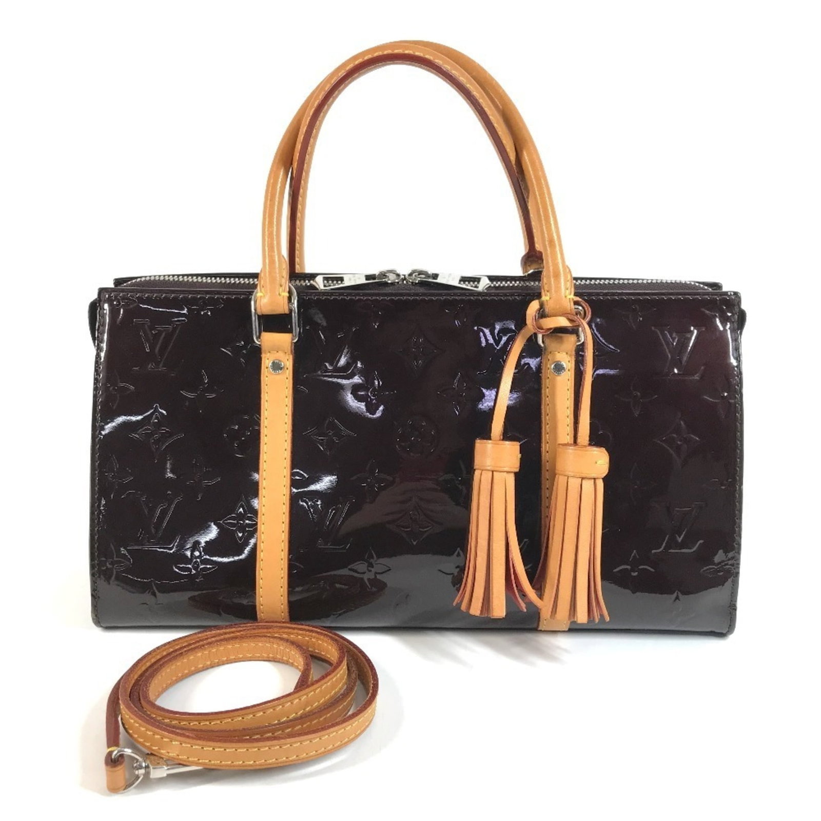 Louis Vuitton Handbag Shoulder Bag Tote Bag Monogram Vernis: Louis Vuitton Handbag Shoulder Bag Tote Bag Monogram Vernis Amarante Monogram Vernis Louis Vuitton shoulder bag features a rich, purple hue and iconic monogram pattern, showcasing the brand's