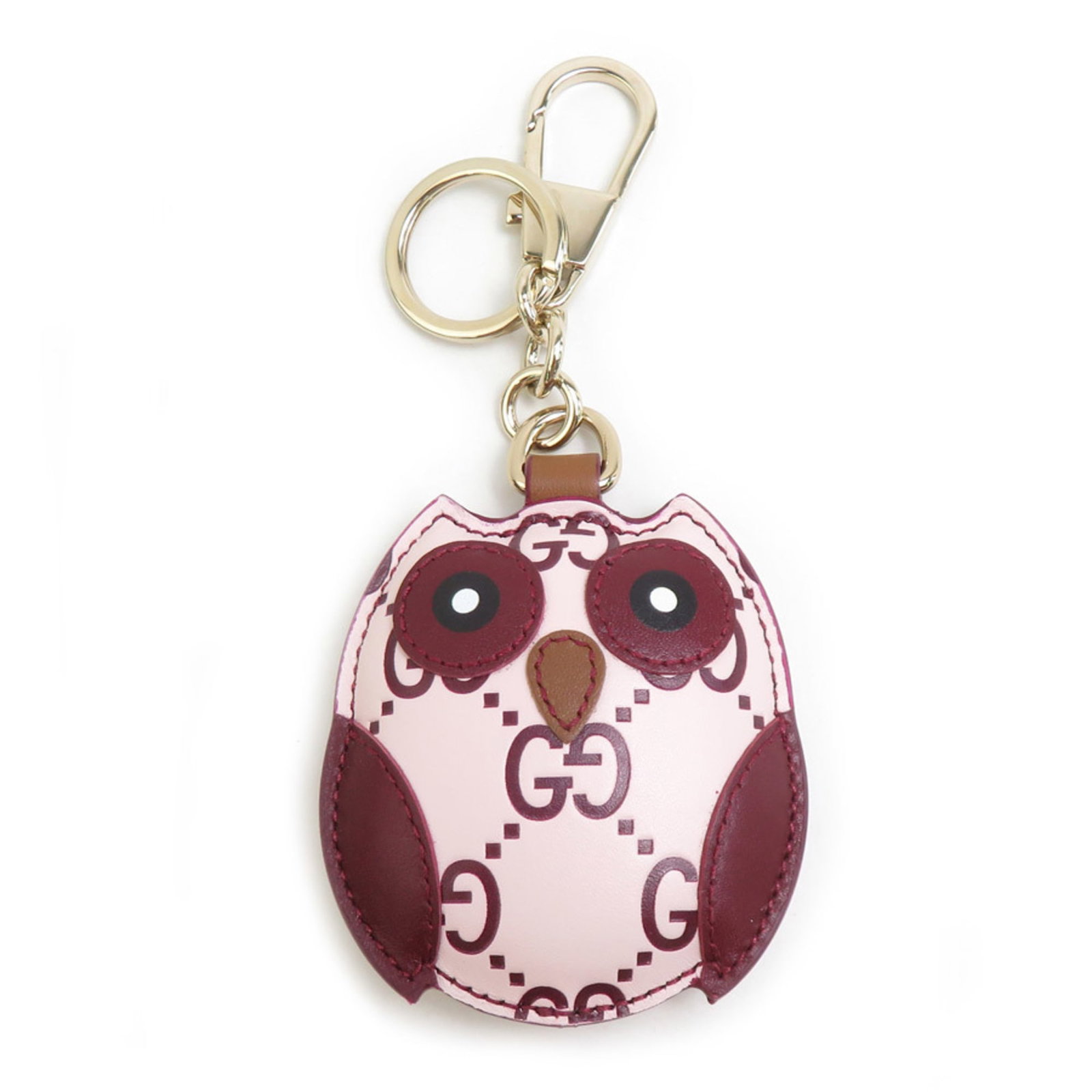 Keyring Leather Metal Gucci: Keyring Leather Metal Gucci Burgundy, gold, and light pink come together in this Gucci keyring, featuring a combination of leather and metal materials. The 15cm x 6.5cm size makes it a stylish accesso