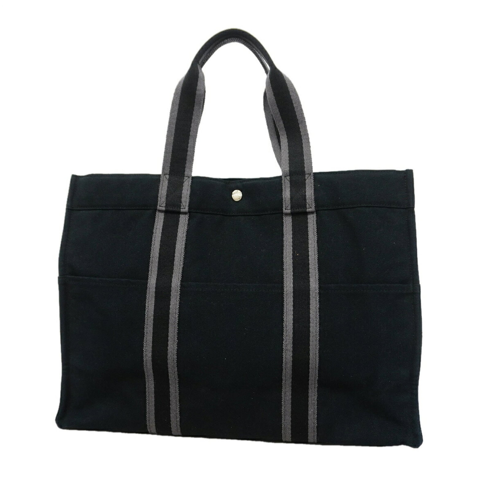 Canvas tote bag Hermes: Canvas tote bag Hermes Canvas tote bag from Hermes, made from high-quality canvas material in a sleek black color, features silver hardware for a touch of sophistication. The bag measures 34cm x 46cm
