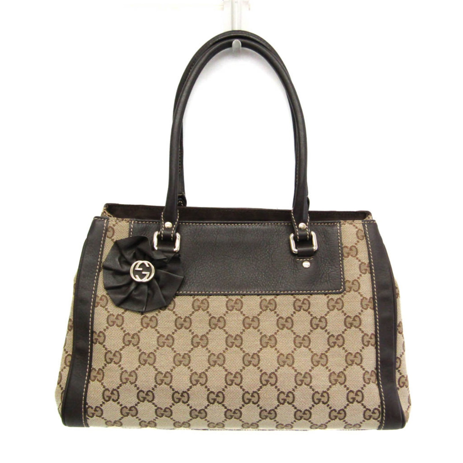 Canvas Leather Handbag Gucci: Canvas Leather Handbag Gucci Canvas Leather Handbag Gucci - A Timeless Beige ClassicThe Gucci Canvas Leather Handbag boasts a sleek, all-beige design with a touch of brown accents, perfectly balanced
