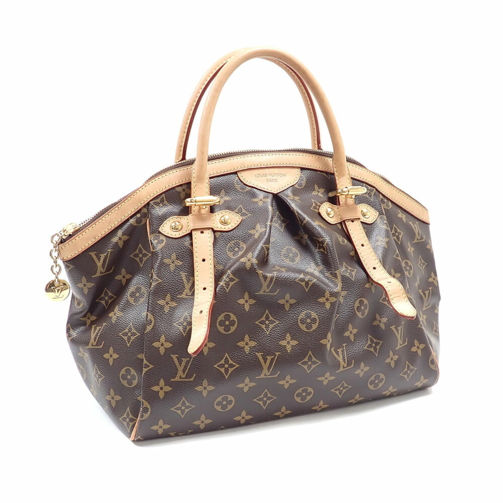 Louis Vuitton Monogram Handbag: Louis Vuitton Monogram Handbag The Louis Vuitton Monogram Handbag boasts its iconic monogram pattern, a hallmark of the brand's signature style. Measuring 28cm x 46cm x 20cm, this stylish tote