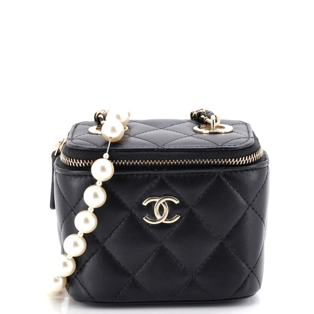Vanity Case with Pearl Chain Quilted Lambskin Mini from Chanel: Vanity Case with Pearl Chain Quilted Lambskin Mini from Chanel Black faux pearl leather quilted lambskin mini clutch from Chanel, featuring a gold tone strap drop of 22". Measuring 3.5" in height, 4"