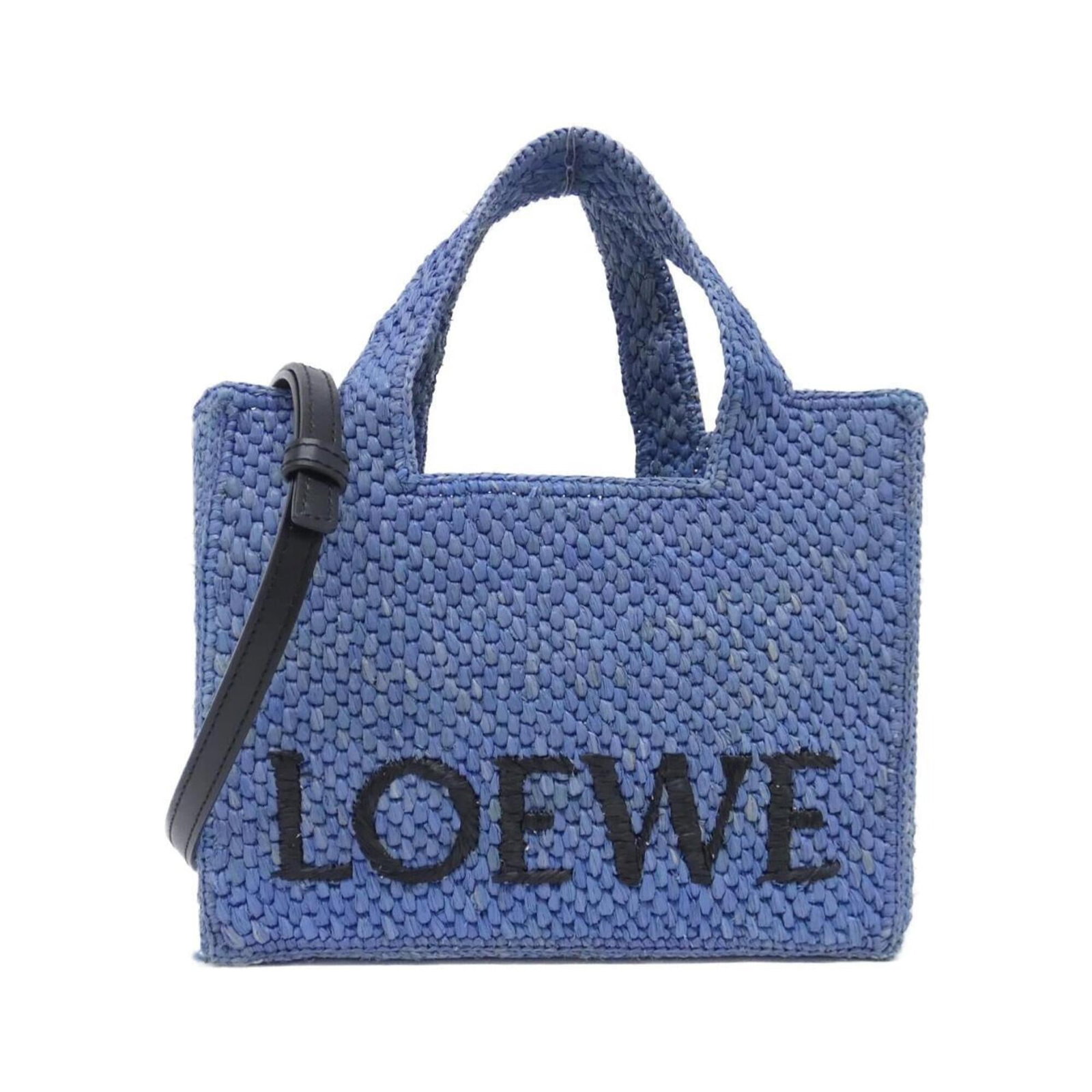 Raffia bag tote Loewe: Raffia bag tote Loewe Raffia bag tote from Loewe, featuring a light blue color and a size of 19cm x 23cm x 10cm. This tote bag is made from high-quality raffia material, providing a natural and