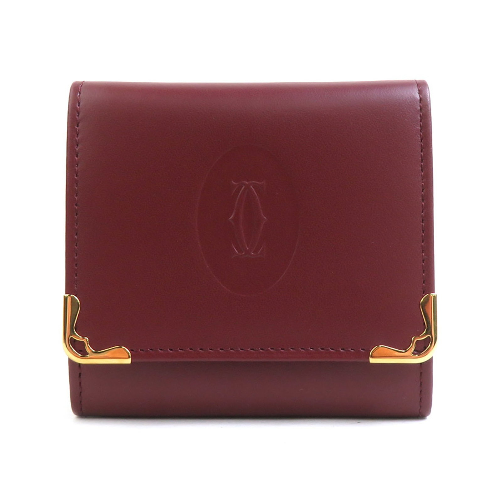 Coin Case Leather Purse Cartier: Coin Case Leather Purse Cartier Cartier's leather coin purse is a stylish and compact accessory, measuring 7.5cm x 8cm x 2cm, with a rich Bordeaux color. The purse comes with a box and shop card, prov