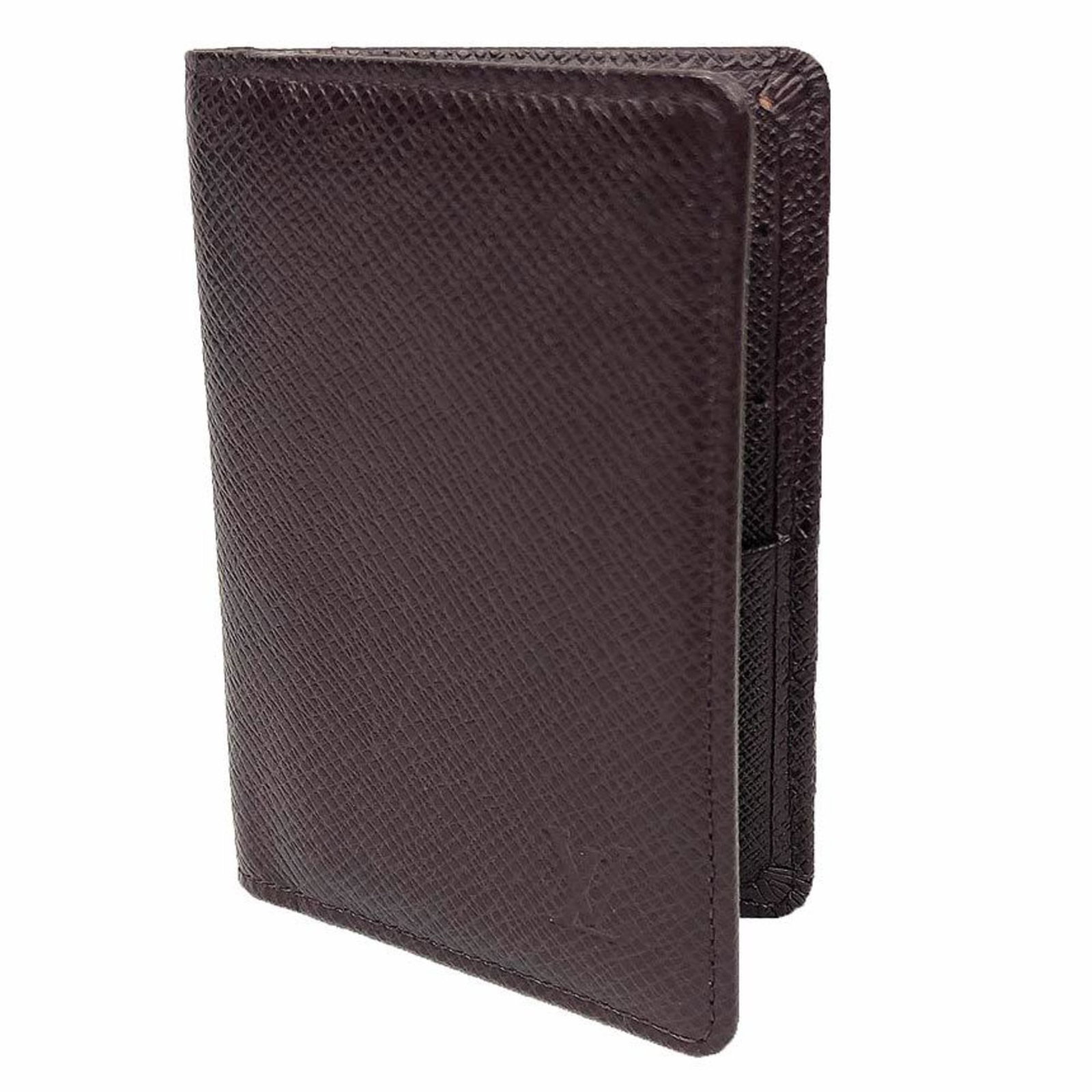 Taiga Leather Louis Vuitton Card Case: Taiga Leather Louis Vuitton Card Case Taiga Leather Louis Vuitton Card Case is made from Taiga leather, a high-quality material known for its durability and rich texture. The card case measures 11cm x