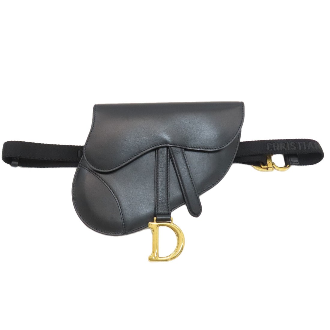 Christian Dior Saddle Calf Hip Bag Waist: Christian Dior Saddle Calf Hip Bag Waist Christian Dior Saddle Calf Hip Bag Waist in black calf leather. This sleek and modern hip bag features a signature Dior design with a distinctive
