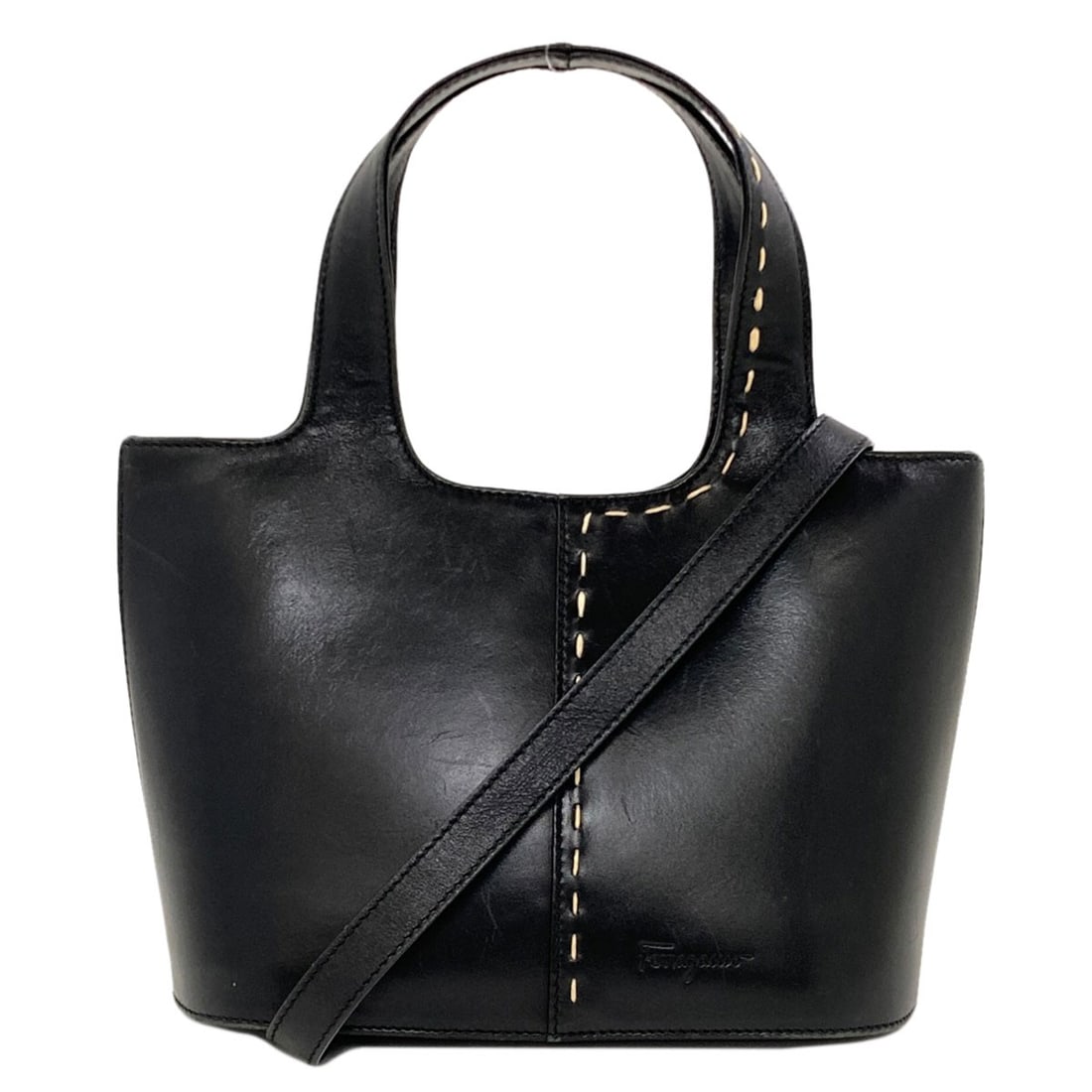 Salvatore Ferragamo Stitch 2Way Handbag Leather: Salvatore Ferragamo Stitch 2Way Handbag Leather Stitch 2Way Handbag Leather from Salvatore Ferragamo - a sleek and sophisticated black leather handbag with a unique 2Way design. The exterior is made