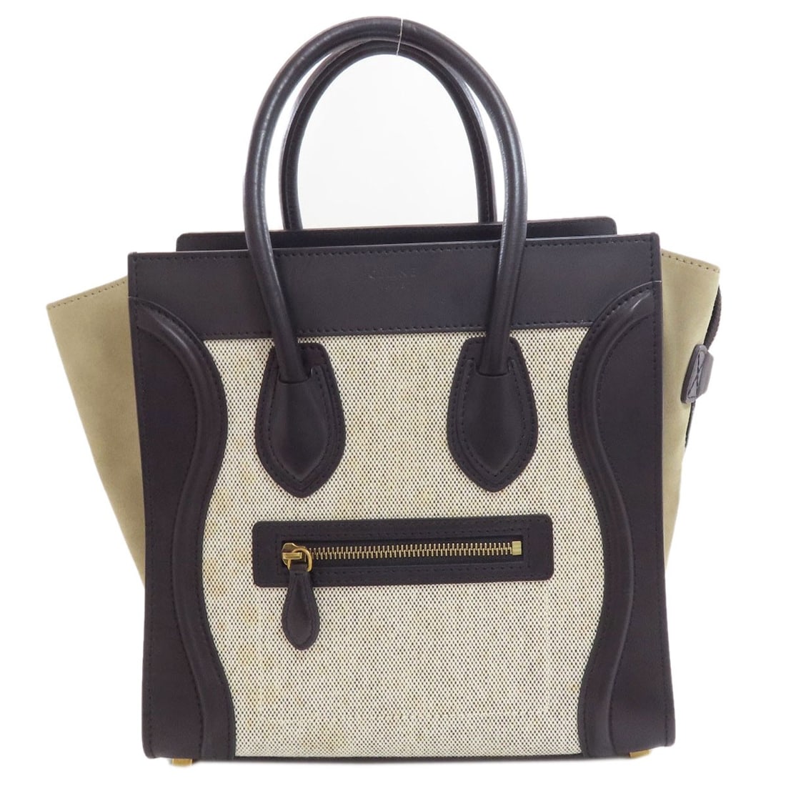 Calf Canvas Micro Celine Luggage: Calf Canvas Micro Celine Luggage Calf canvas construction gives this Celine micro bag a sturdy and premium feel. The sleek black design and 10.8-inch height make it a stylish and compact accessory.