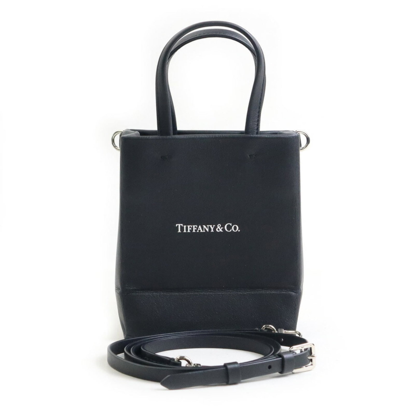Shoulder Bag Leather: Shoulder Bag Leather Black leather shoulder bag from Italy, featuring a sleek design with a 15cm x 12cm x 7.5cm size and a sturdy leather material. Comes with a box, dust bag, and adjustable shoulder