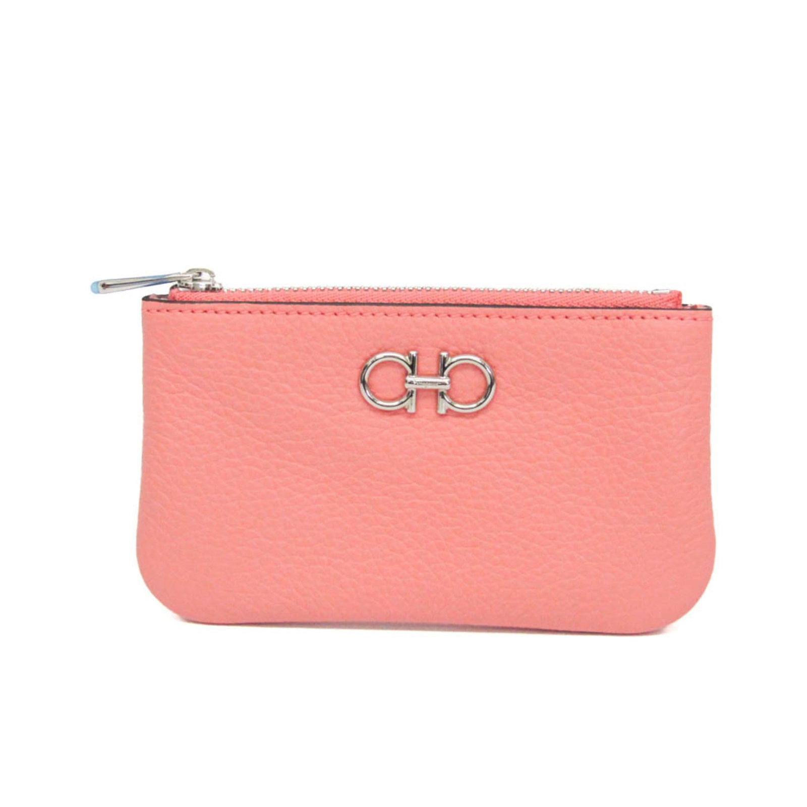 Salvatore Ferragamo Coin Purse/ Coin Case Leather: Salvatore Ferragamo Coin Purse/ Coin Case Leather Salvatore Ferragamo's iconic coin purse features a sleek salmon pink leather exterior, adorned with a 3.2cm key ring, and is secured with a zipper