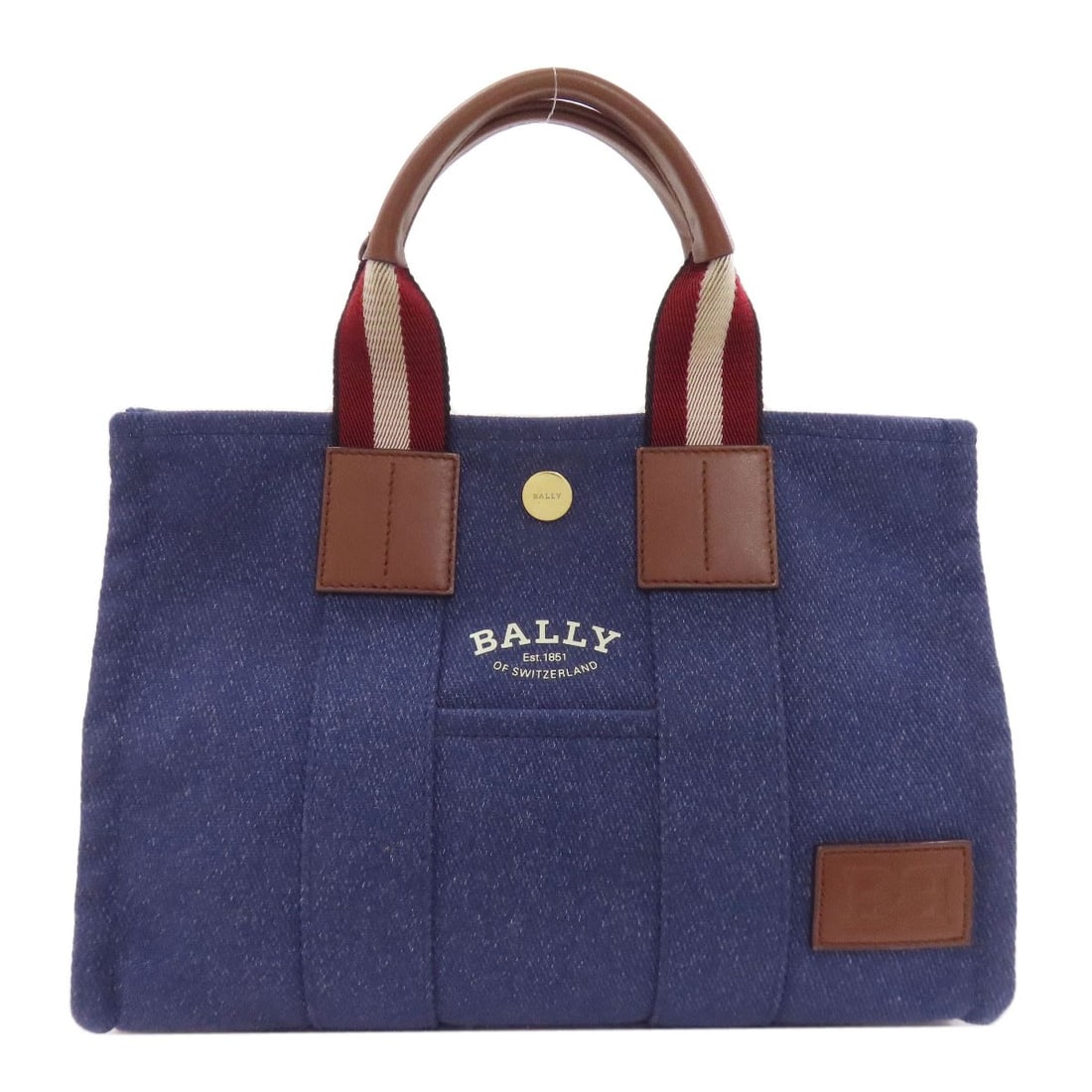 Dry Bally Canvas Saria Handbag: Dry Bally Canvas Saria Handbag Blue canvas Bally handbag with a classic design. Made from canvas, this style features a bold blue exterior color. The dry canvas construction gives the bag a unique