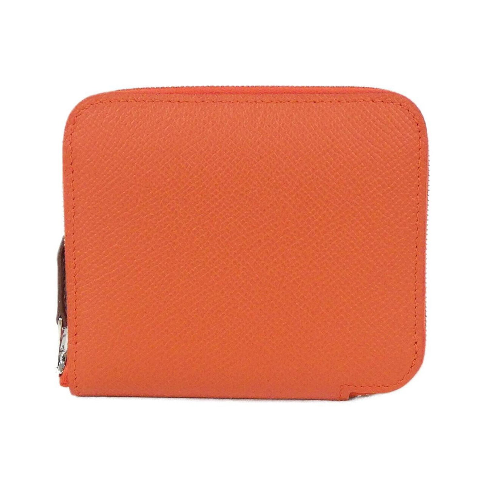 Hermes Coin Purse/ Coin Case Epsom Leather Silk: Hermes Coin Purse/ Coin Case Epsom Leather Silk Epsom leather and silk come together in this elegant coin purse, crafted in the iconic Capucine red color. Measuring 9cm x 11cm x 1.5cm, it offers a
