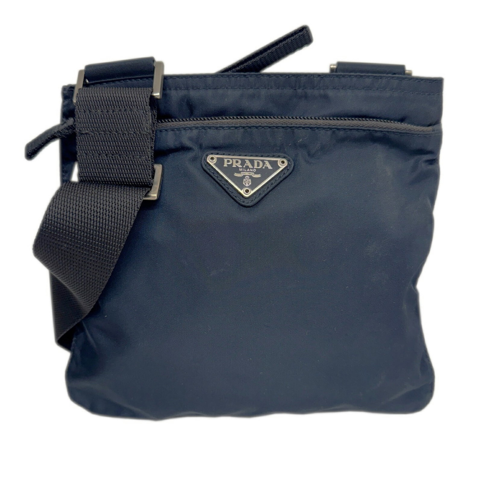 Pochette Nylon Shoulder Bag Prada: Pochette Nylon Shoulder Bag Prada Navy Prada Pochette Nylon Shoulder Bag, 20cm x 21cm x 1cm, 127cm Strap Length, Includes Dust Bag and Guarantee Card. This Prada Pochette Nylon Shoulder Bag features