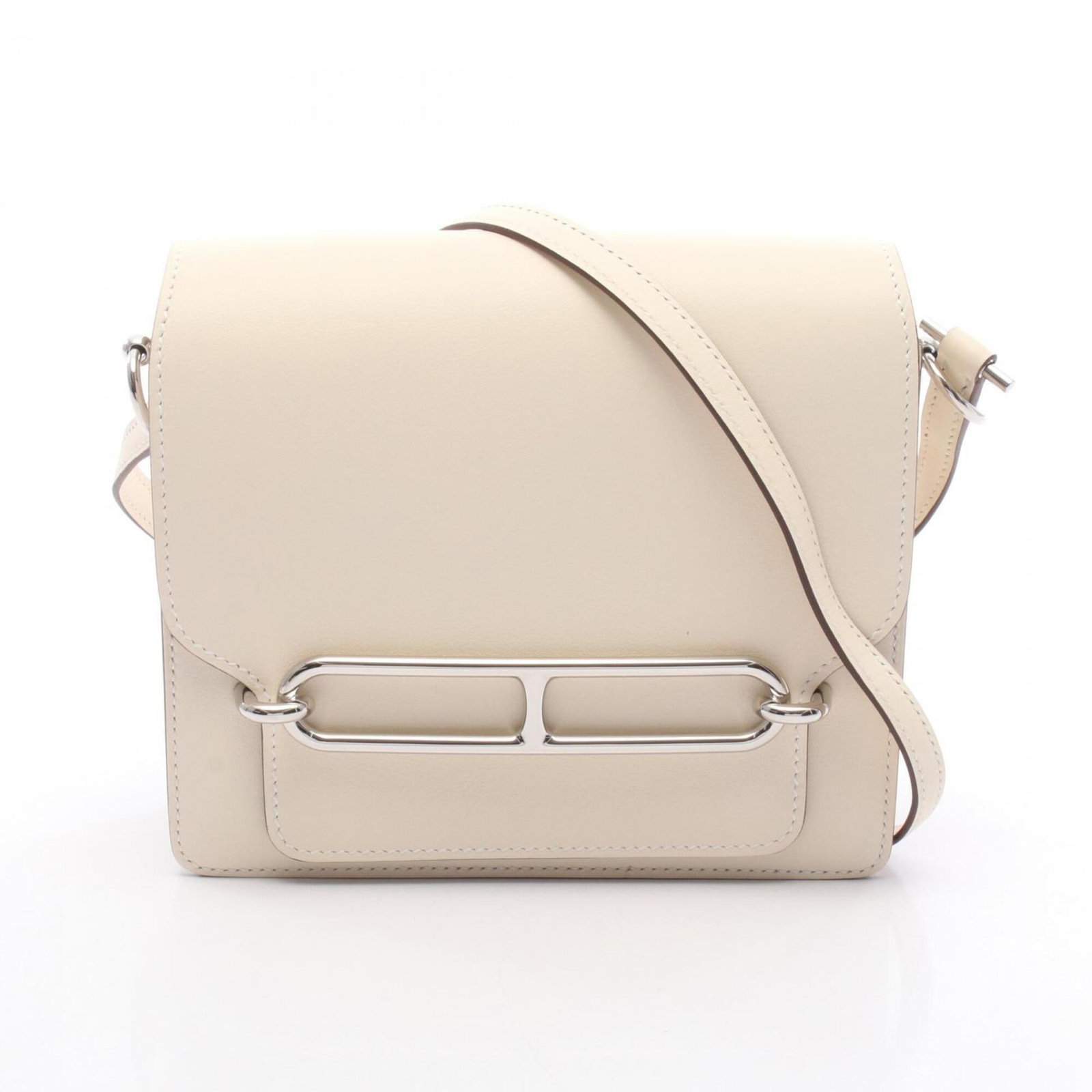 Swift Leather Shoulder Bag Hermes: Swift Leather Shoulder Bag Hermes Swift Leather Shoulder Bag by Hermes - A sleek and sophisticated accessory, this ivory Swift leather shoulder bag features silver hardware and a compact size, making 