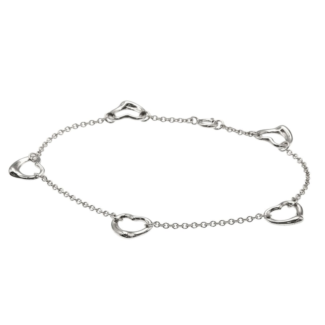 Open Heart Bracelet Silver by Tiffany&Co: Open Heart Bracelet Silver by Tiffany&Co Silver Open Heart Bracelet by Tiffany&Co, a sleek and modern design featuring a silver metal exterior, this bracelet is a simple yet elegant accessory. With no