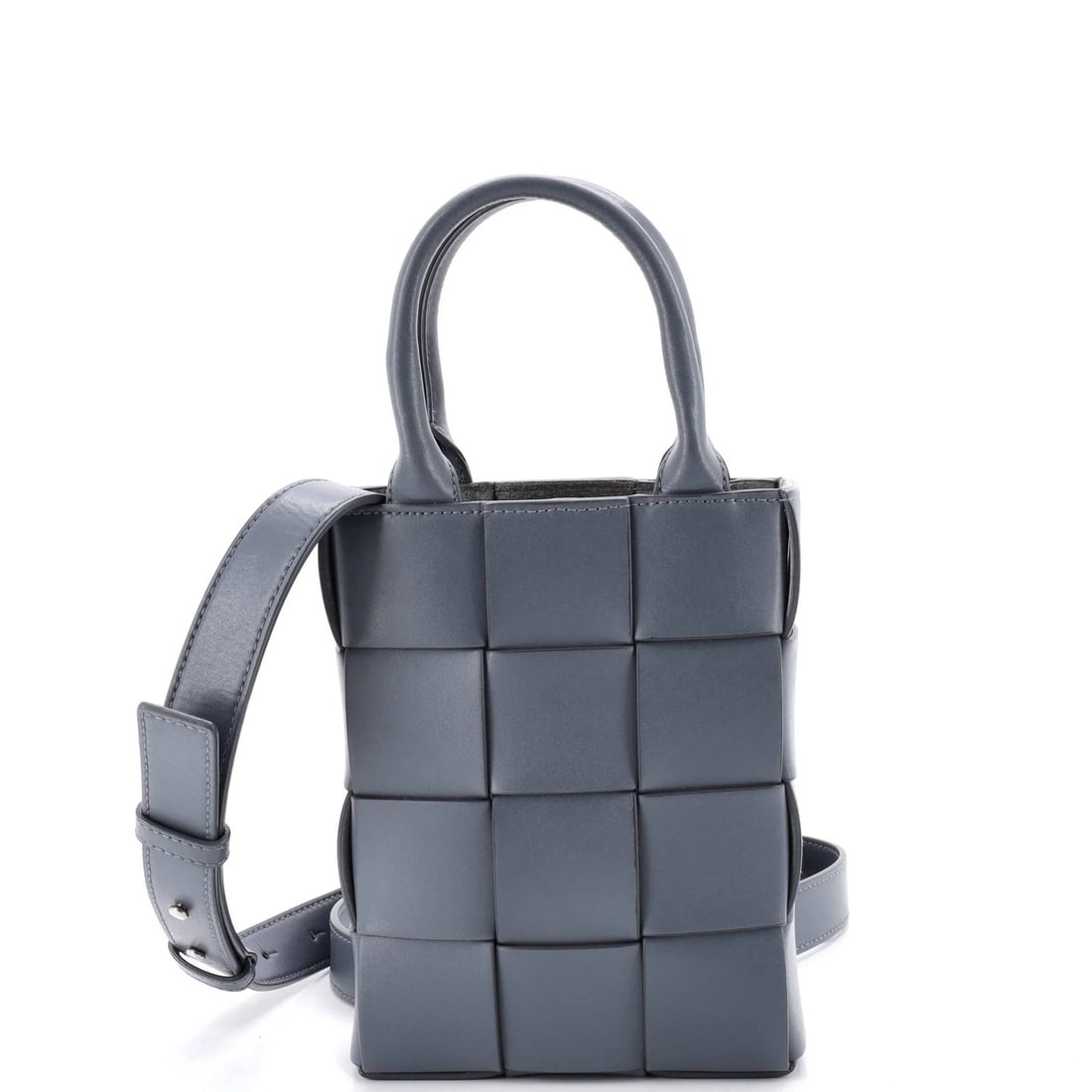 Intrecciato Leather Tote Convertible Maxi Cassette Bottega: Intrecciato Leather Tote Convertible Maxi Cassette Bottega Blue Intrecciato Leather Mini Cassette Convertible Tote with Strap, measuring 5" handle drop, 9" height, 5" width, and 2.5" depth, features