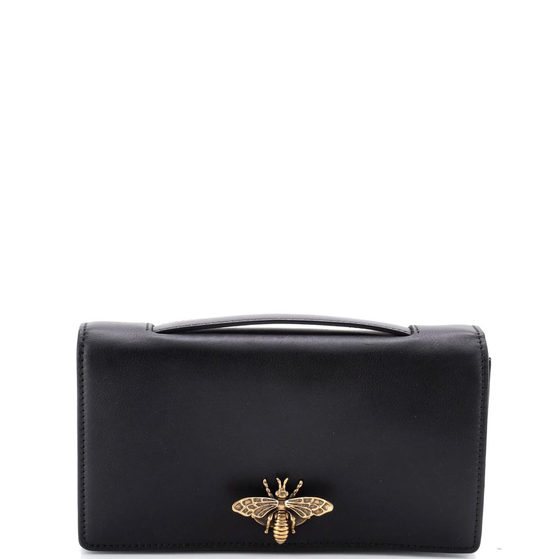 Bee Clutch Dior Leather Christian: Bee Clutch Dior Leather Christian Black leather exterior with aged gold hardware, this Bee Clutch Dior features a sleek design and classic style. Measuring 4" in height and 7" in width, it has a compa