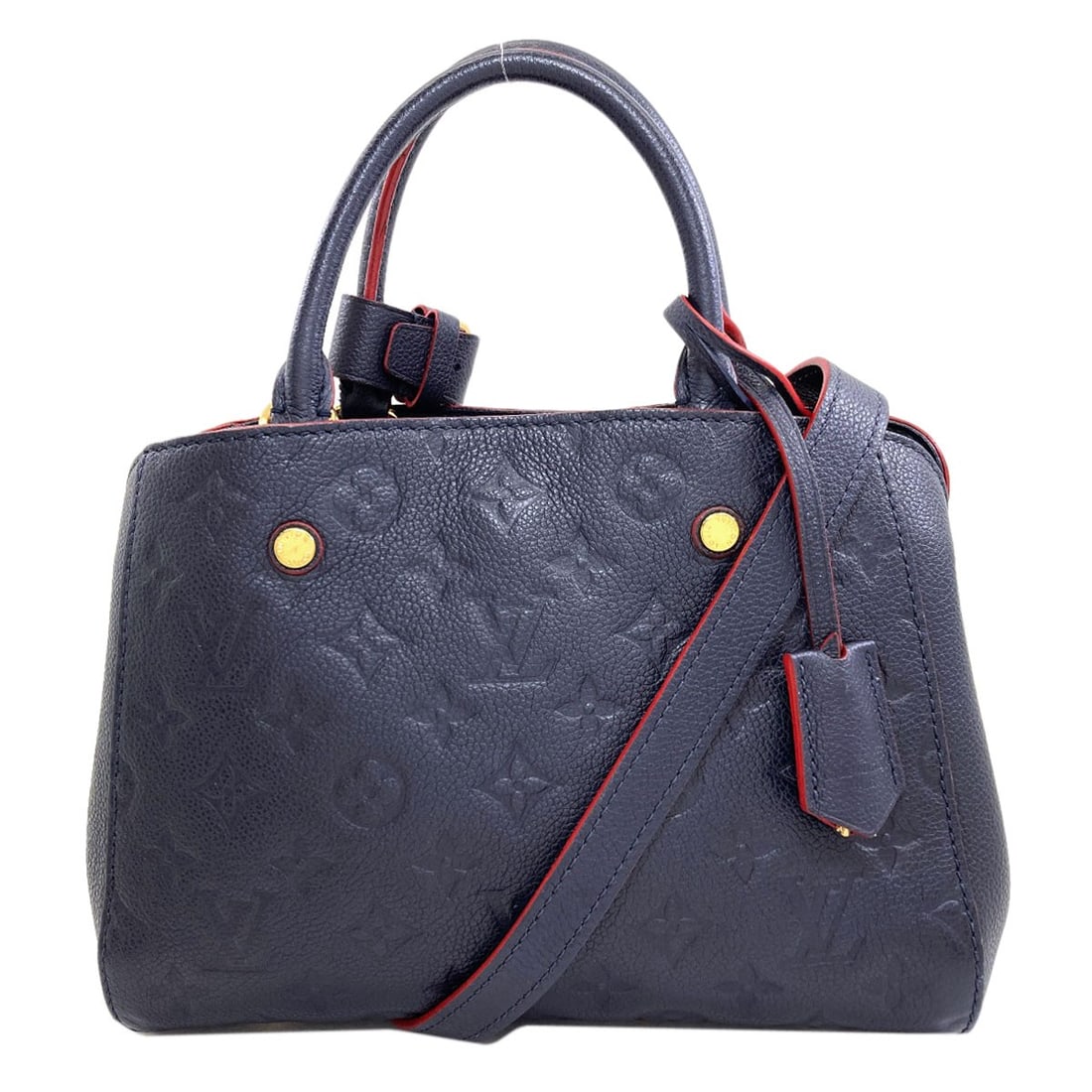 Louis Vuitton M42747 Handbag Montaigne Empreinte Bb: Louis Vuitton M42747 Handbag Montaigne Empreinte Bb Navy Louis Vuitton M42747 Handbag with Empreinte Bb exterior features a classic design, showcasing the iconic Empreinte pattern. This Montaigne