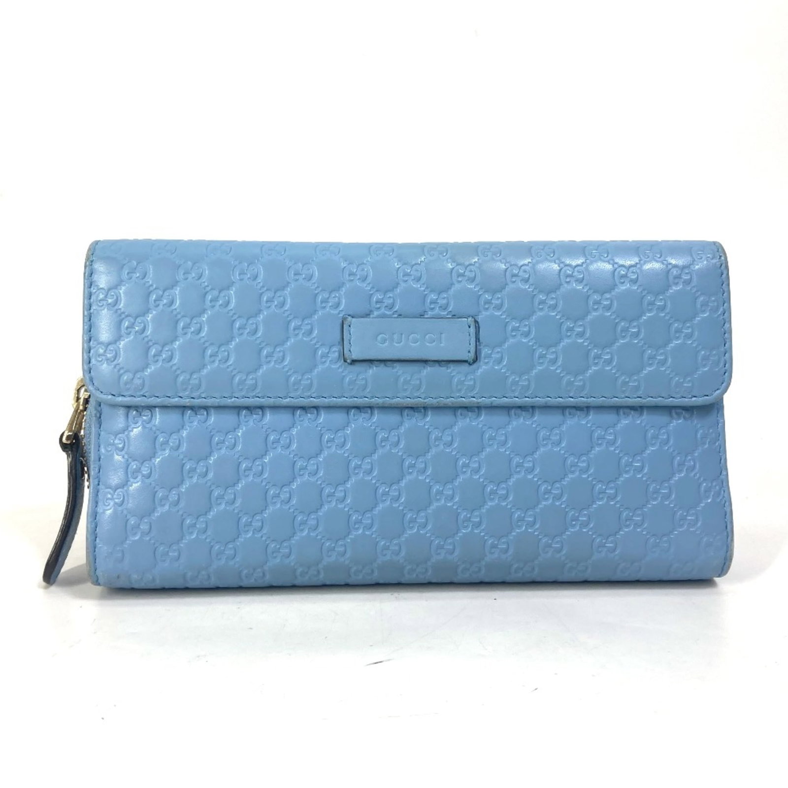 Gucci Long Wallet (Bi-Fold) Leather: Gucci Long Wallet (Bi-Fold) Leather Blue Gucci Long Wallet (Bi-Fold) Leather. This bi-fold long wallet features a blue leather material, measuring 18.5cm x 9.5cm and 7.3cm x 3.7cm. The wallet's design