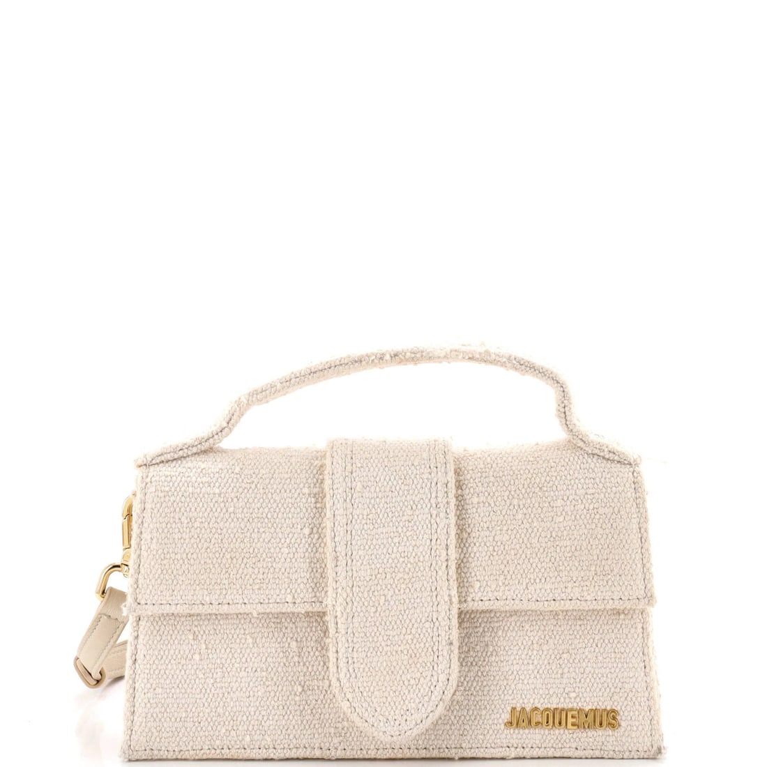 Le Grand Bambino Flap Leather Bag: Le Grand Bambino Flap Leather Bag The Le Grand Bambino Flap Leather Bag boasts a neutral exterior with minor fraying, corner wear, and discoloration, adding a touch of subtle character. Its aged gold