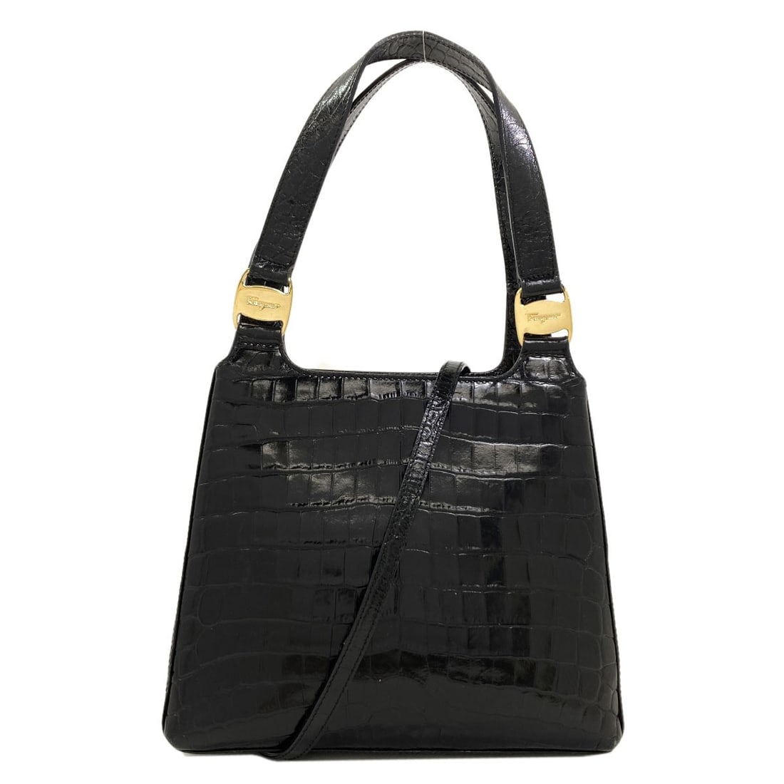 Ferragamo Salvatore Handbag 2Way Leather: Ferragamo Salvatore Handbag 2Way Leather Black 2Way Leather Handbag by Salvatore Ferragamo. This sleek handbag boasts a striking 2Way Leather design, showcasing the brand's signature style. Made from