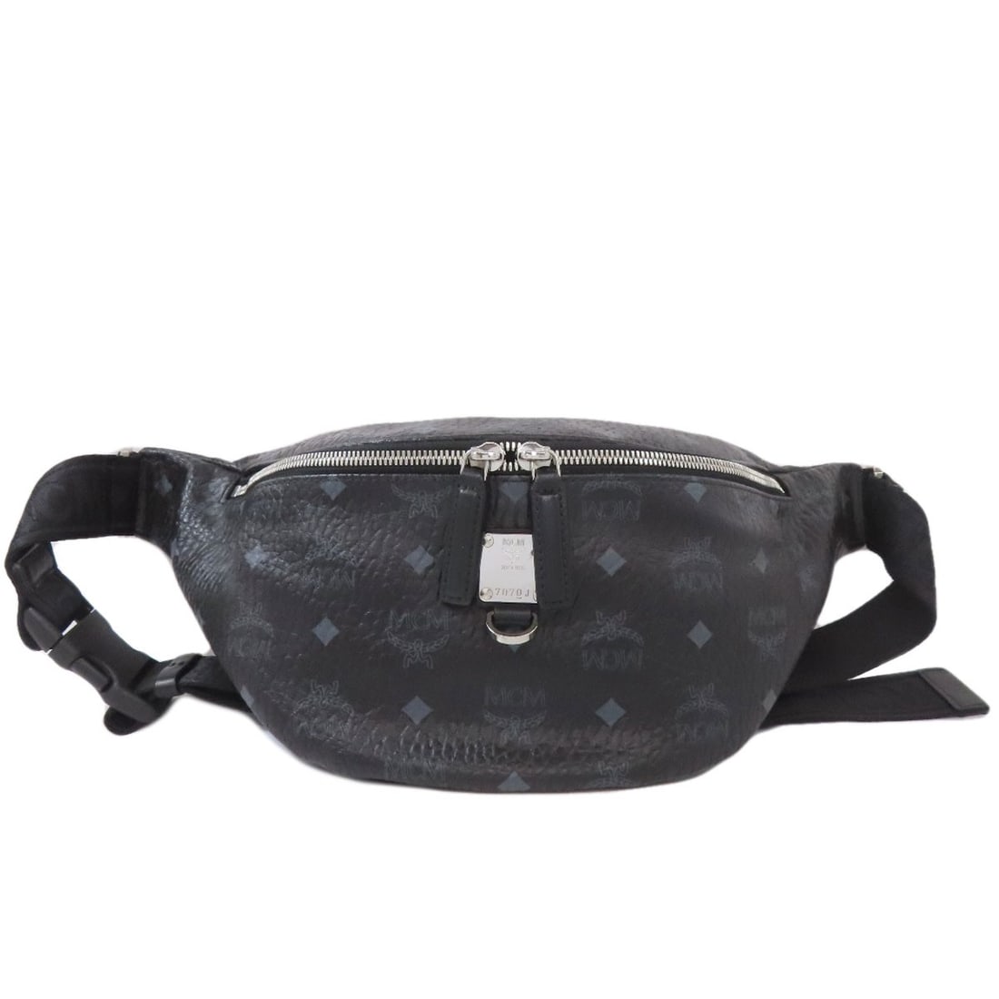 Mcm Logo Body Bag Pvc: Mcm Logo Body Bag Pvc Black PVC body bag with the iconic MCM logo, a stylish accessory for those who appreciate the brand's edgy aesthetic. Made from durable PVC material, this bag is built to last.