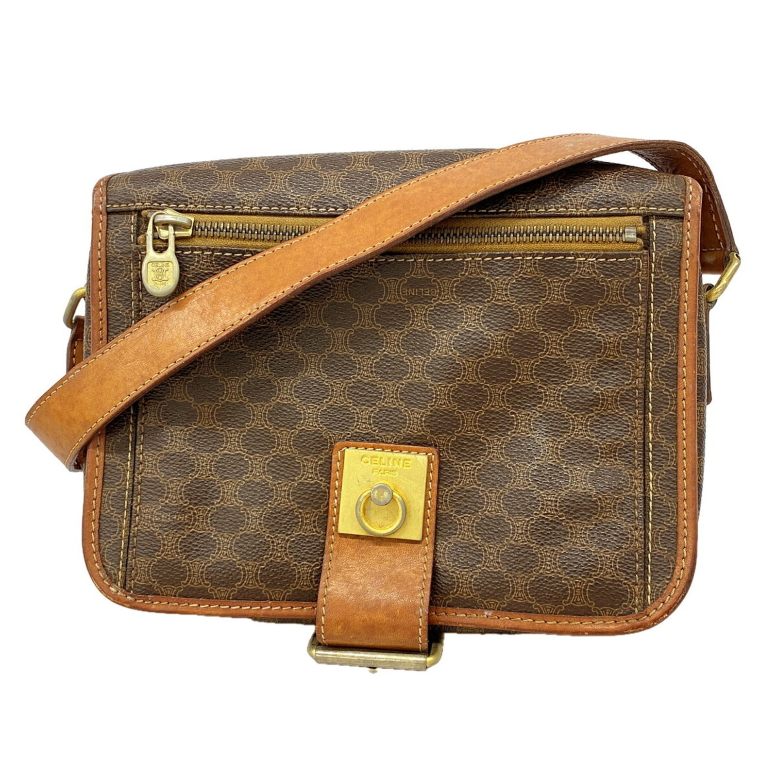 Celine Shoulder Bag Pvc: Celine Shoulder Bag Pvc This Celine shoulder bag is made of PVC and features a brown color with gold hardware. It measures 16cm x 22cm x 6.5cm and has a sleek, compact design. The bag bears a signatur