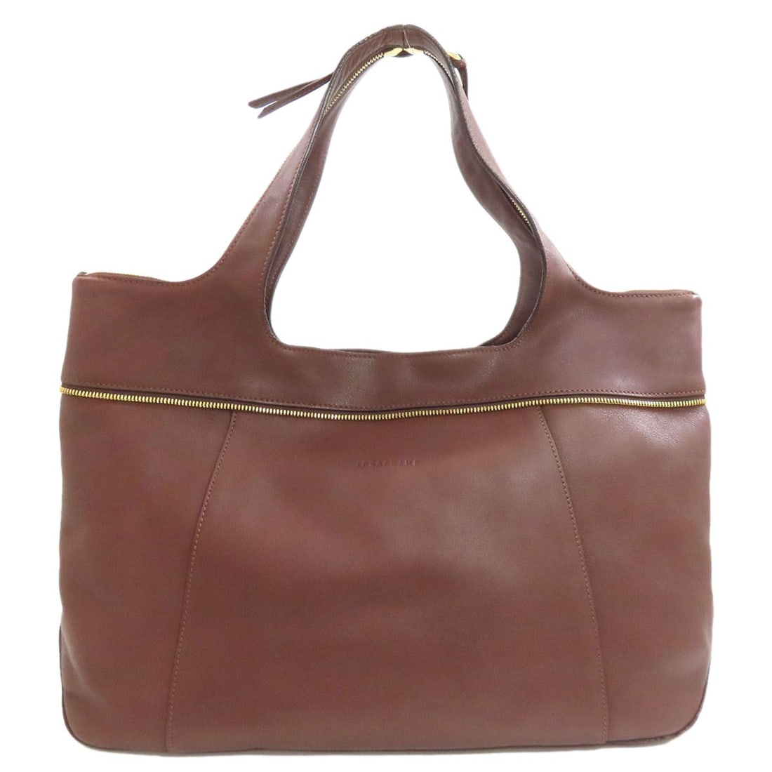 Tote Bag Leather Longchamp Imperial: Tote Bag Leather Longchamp Imperial Brown leather tote bag from Longchamp, made from high-quality leather. This Imperial style tote features a classic design with a timeless look. Item Specifics: