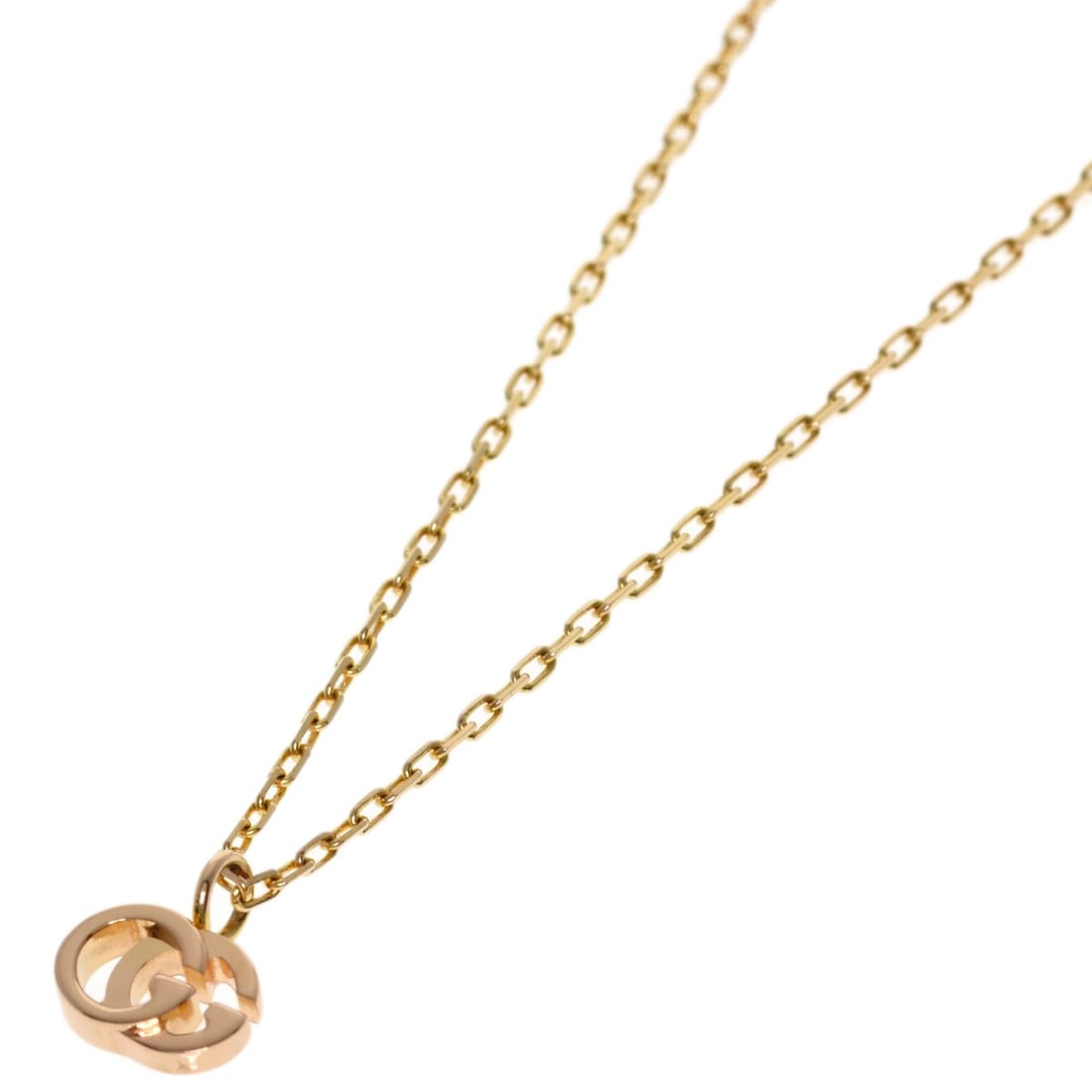 K18 Pink Gold Double G Necklace: K18 Pink Gold Double G Necklace K18 Pink Gold Double G Necklace is a luxurious piece, featuring a K18 pink gold material and a signature. The necklace boasts a 16.5-inch length and an open closure, ma