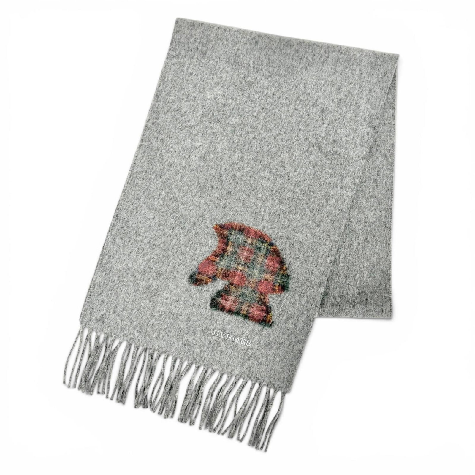 Hermes Stole Wool Cashmere: Hermes Stole Wool Cashmere The Hermes Stole Wool Cashmere is a luxurious piece measuring 1.48m x 26.5cm, boasting a soft gray color and made from a blend of cashmere and wool. This elegant stole
