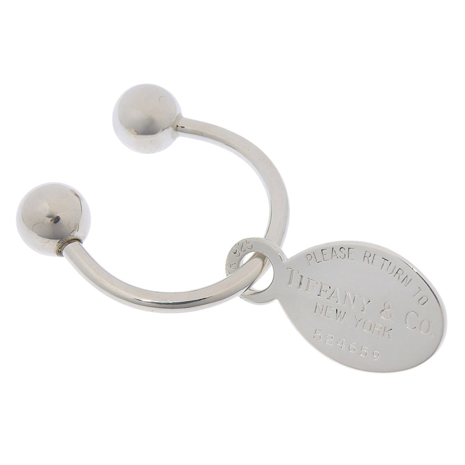Tiffany Keyring Silver 925: Tiffany Keyring Silver 925 Silver 925 Tiffany Keyring, measuring 2.9cm x 1.5cm, is crafted from high-quality silver material. Weighing 9.6g, this keyring is a compact accessory. The item bears a