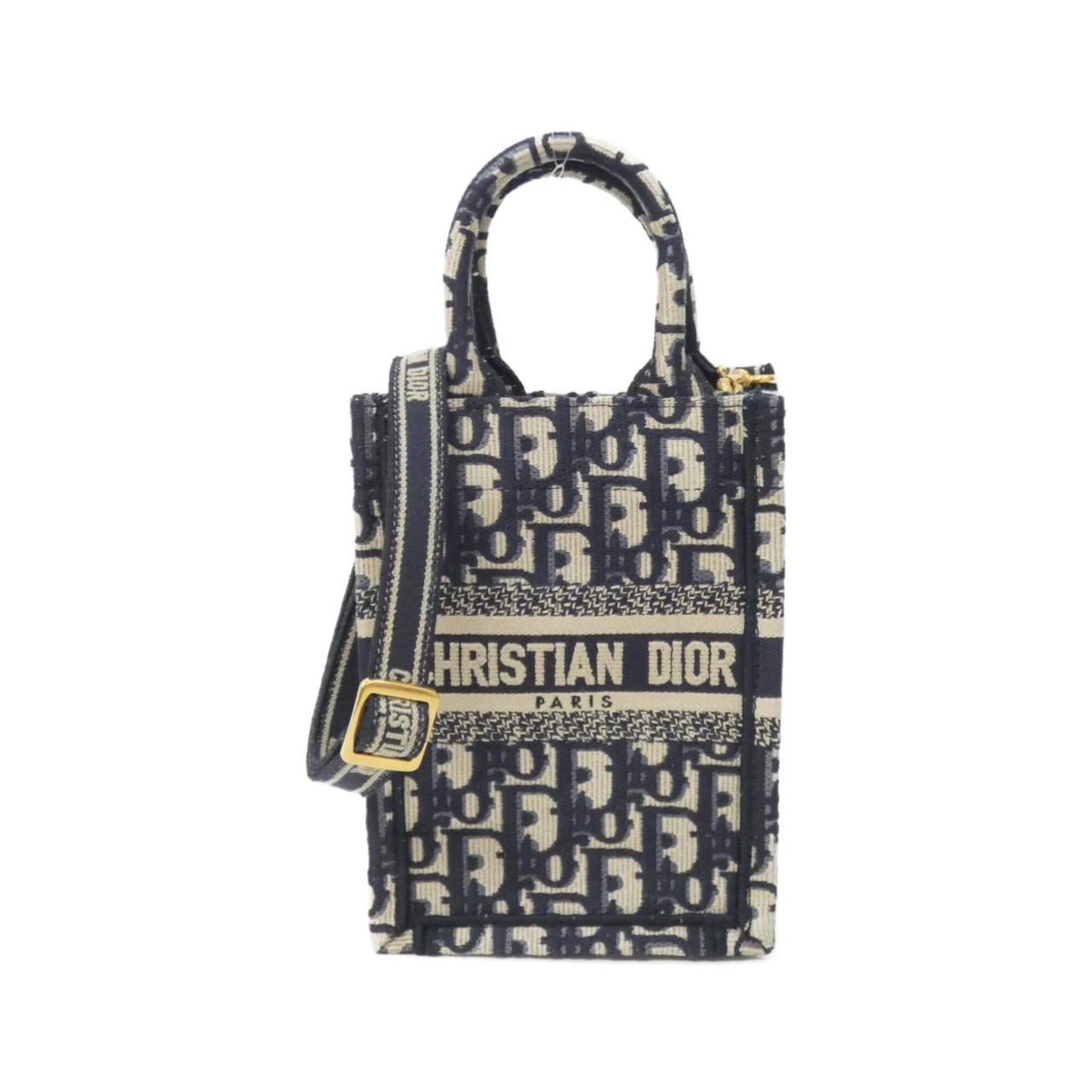 Christian Dior Handbag Canvas: Christian Dior Handbag Canvas Canvas bag from Christian Dior, featuring a signature and measuring 18cm x 13cm x 5cm, with a blue and navy color combination. This canvas handbag is a unique and stylish