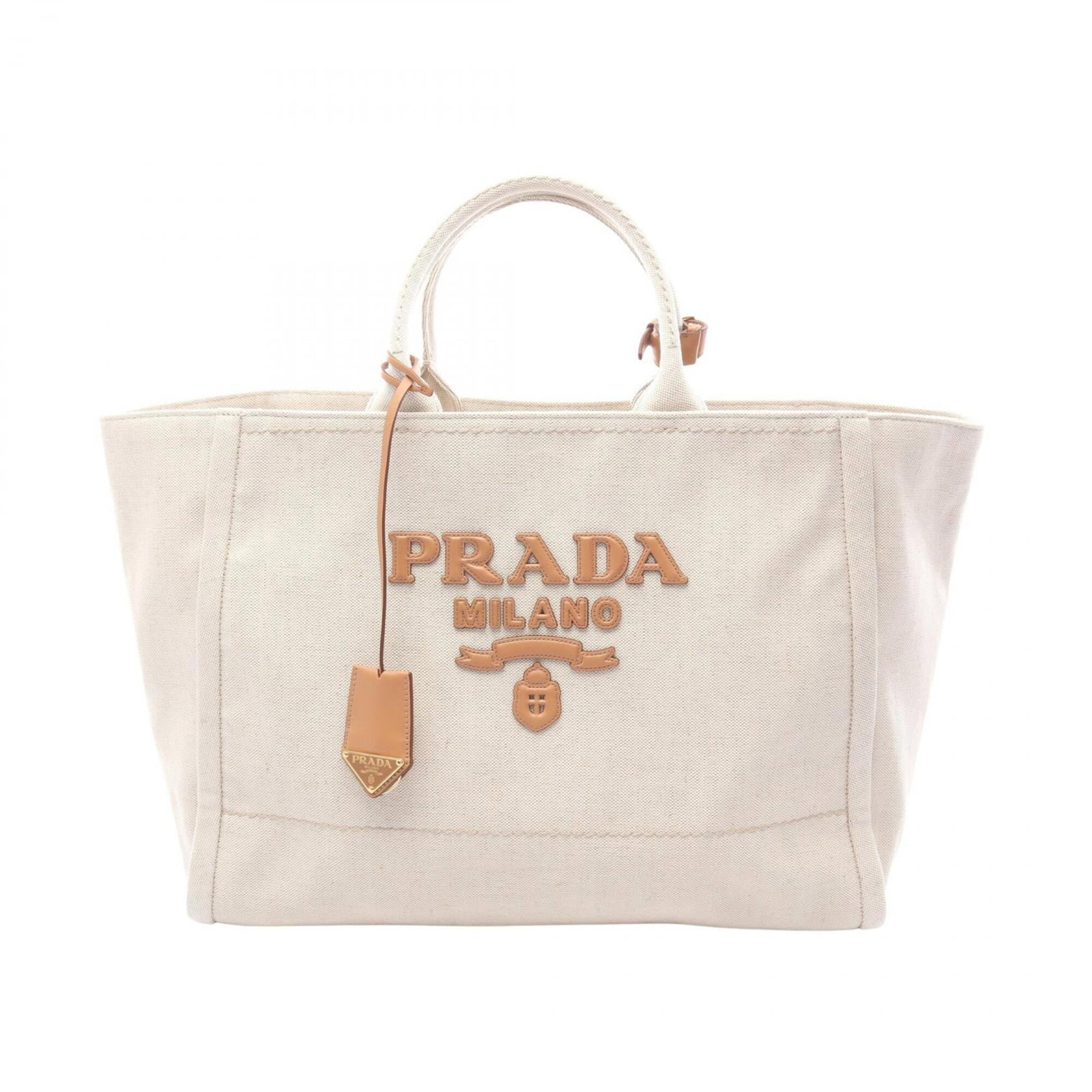 Canvas tote bag Prada handbag: Canvas tote bag Prada handbag Canvas tote bag from Prada, featuring a classic brown and ivory color combination. Measuring 34cm x 44.5cm x 17cm, this canvas tote bag is a stylish and practical accesso