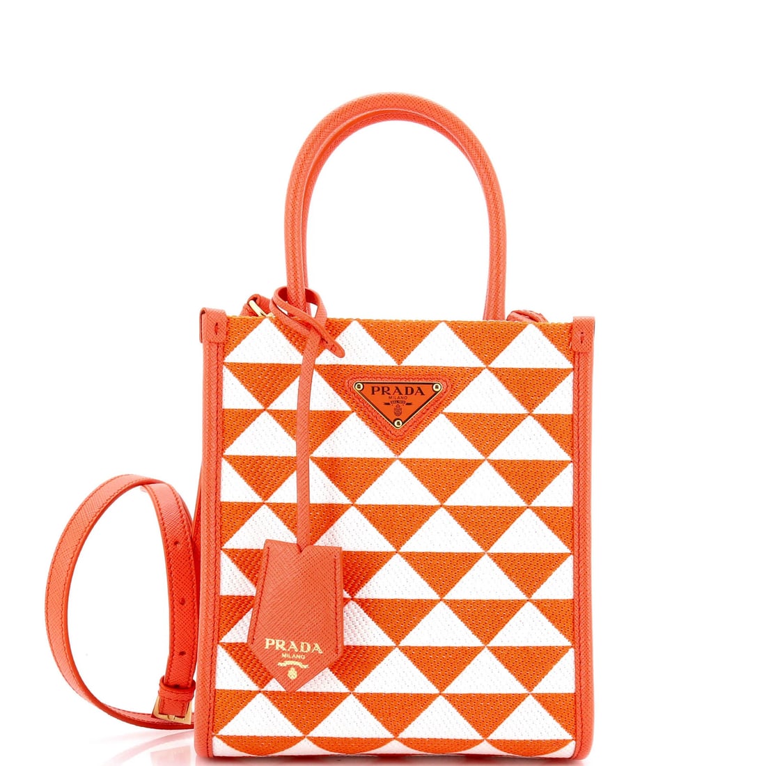 Jacquard Mini Tote Shopper Symbole Prada: Jacquard Mini Tote Shopper Symbole Prada The Prada Symbole Shopper Tote Jacquard Mini is a vibrant orange cross body bag with a unique Jacquard pattern. Its exterior features minor glue stains and cre