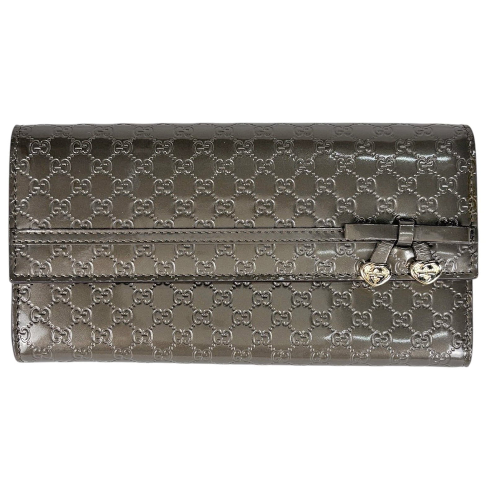 Patent Leather Bi Fold Wallet Gucci: Patent Leather Bi Fold Wallet Gucci Patent leather Gucci wallet features a sleek bi-fold design in grayish color. The MicroGuccissima line adds a touch of modern sophistication to this classic