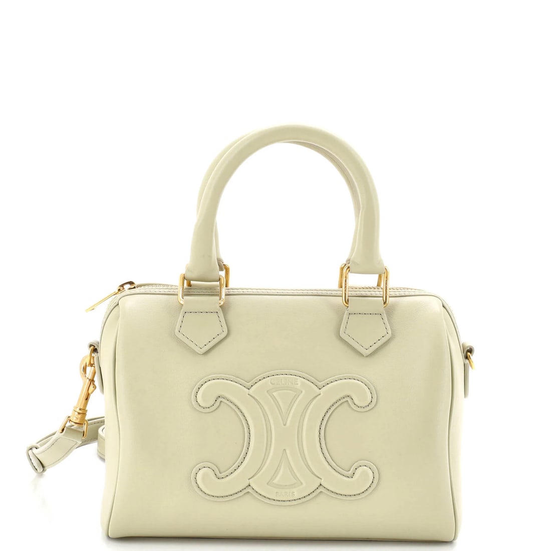 Boston Cuir Leather Small Triomphe Bag: Boston Cuir Leather Small Triomphe Bag The Celine Cuir Triomphe Boston Bag is a stylish small leather bag with a green exterior, featuring a gold-tone hardware and a suede interior. Measuring 5" tall