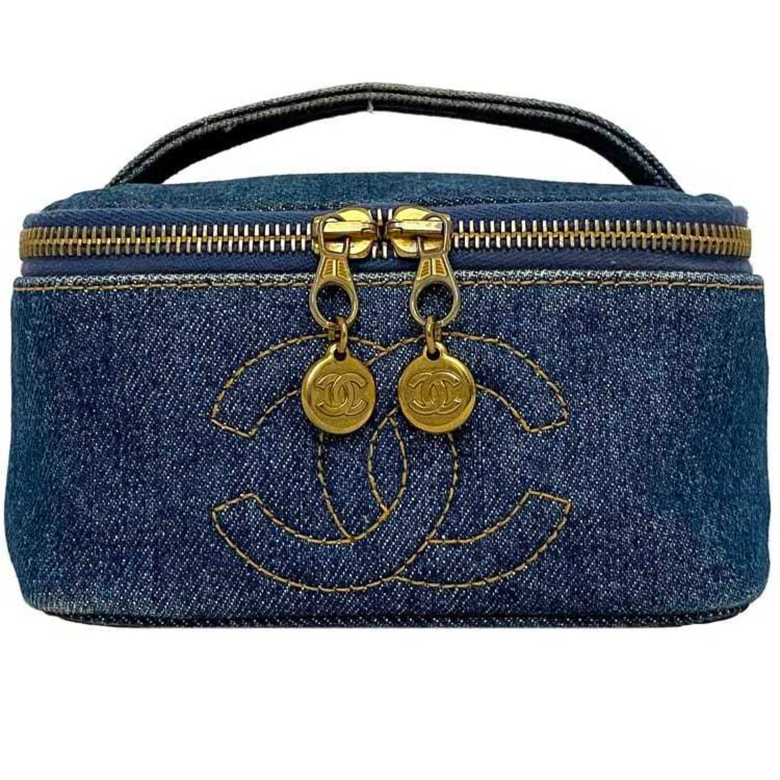 Denim leather vanity pouch handbag Chanel: Denim leather vanity pouch handbag Chanel Denim leather vanity pouch handbag from Chanel's A07058 model boasts a unique denim and leather combination, measuring 9cm x 15.5cm x 15.5cm. The item comes