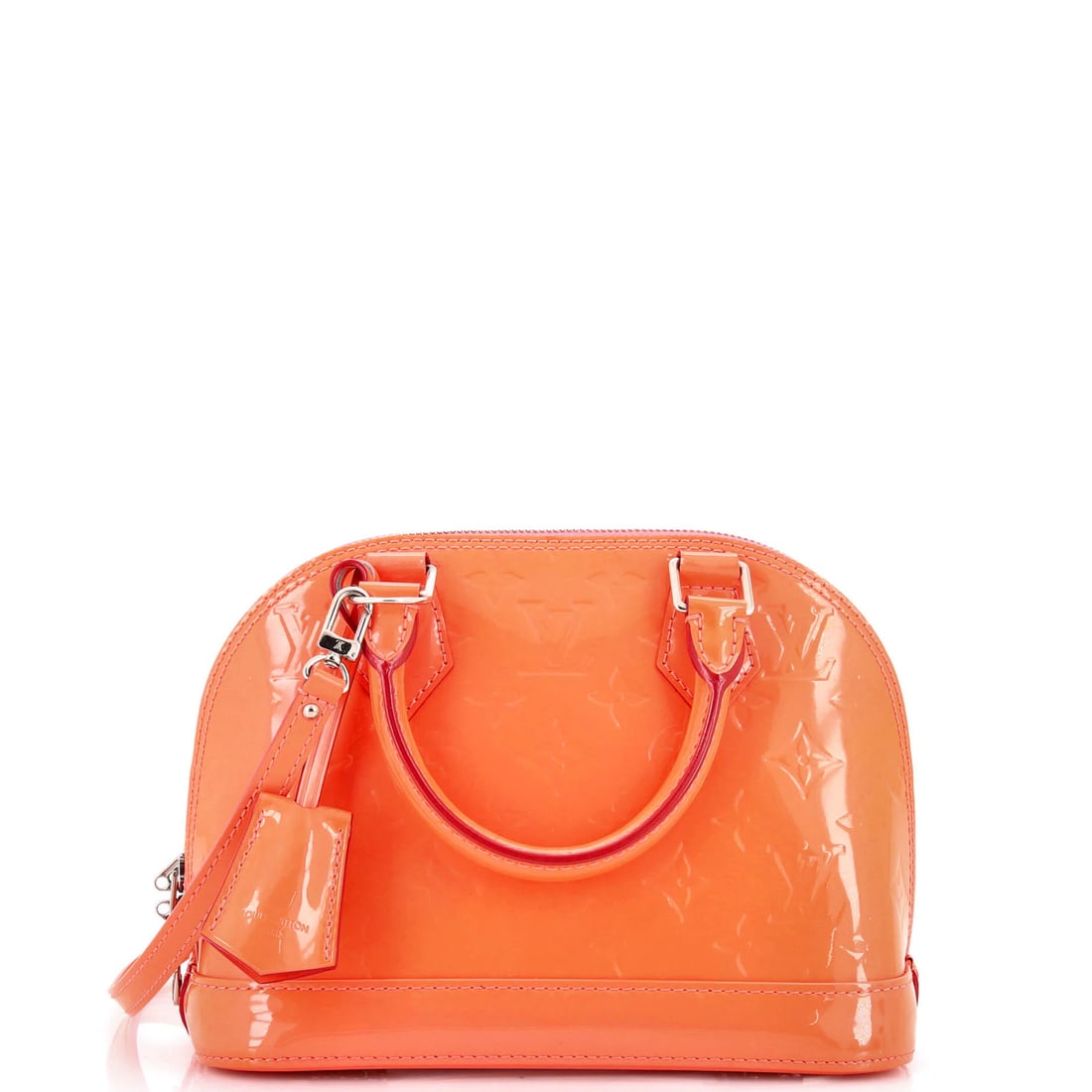 Louis Vuitton Alma Monogram Vernis Handbag: Louis Vuitton Alma Monogram Vernis Handbag The Louis Vuitton Alma Monogram Vernis Handbag boasts a striking pink patent leather exterior, adorned with the iconic Monogram Vernis pattern. This stylish
