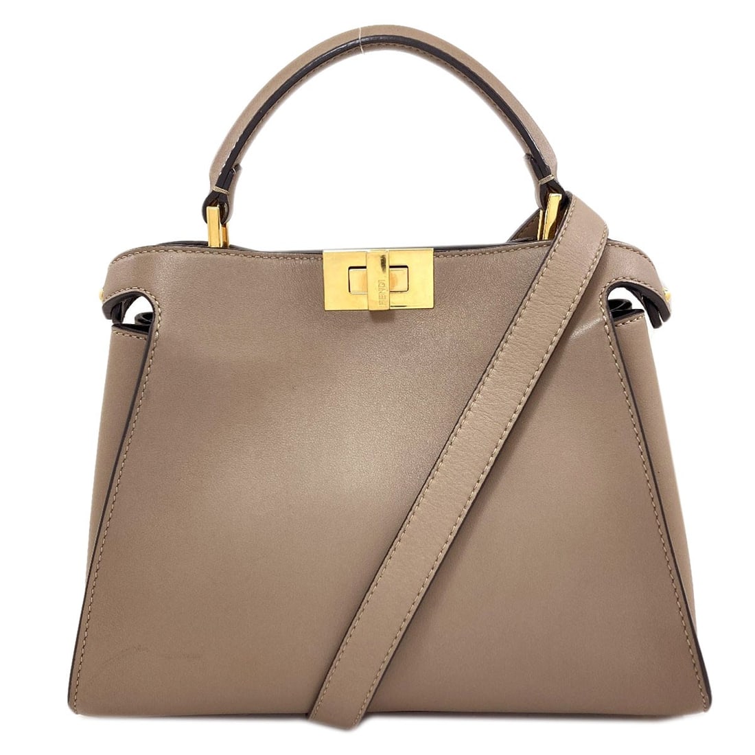 Calf Peekaboo Handbag Essential Fendi 2Way: Calf Peekaboo Handbag Essential Fendi 2Way Beige Calf Peekaboo Handbag from Fendi's 2Way Collection. This classic handbag features a timeless design with a signature Peekaboo style, crafted from high-