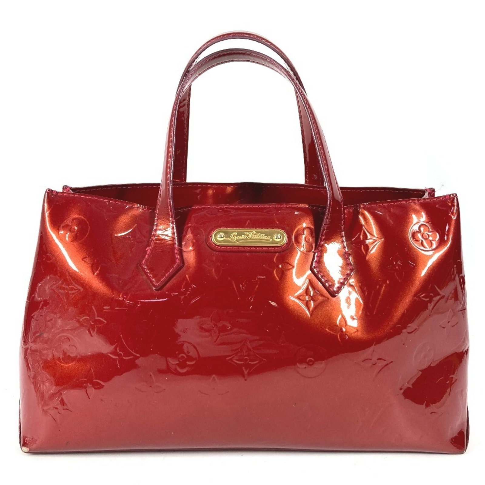 Louis Vuitton Handbag Tote Bag Monogram Vernis Canvas: Louis Vuitton Handbag Tote Bag Monogram Vernis Canvas Monogram Vernis canvas tote bag from Louis Vuitton, featuring the iconic Pomme d'amour red color, adds a pop of elegance to any outfit. With its