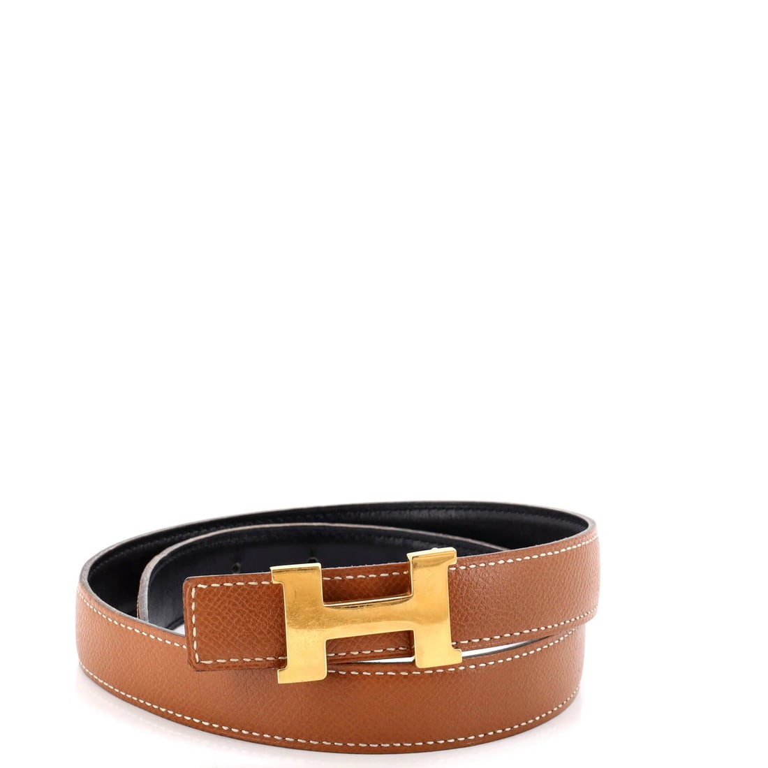 Hermes Leather Thin Reversible Belt: Hermes Leather Thin Reversible Belt The Hermes Leather Thin Reversible Belt is a stylish accessory that combines functionality with a touch of elegance. Made from high-quality leather, this belt